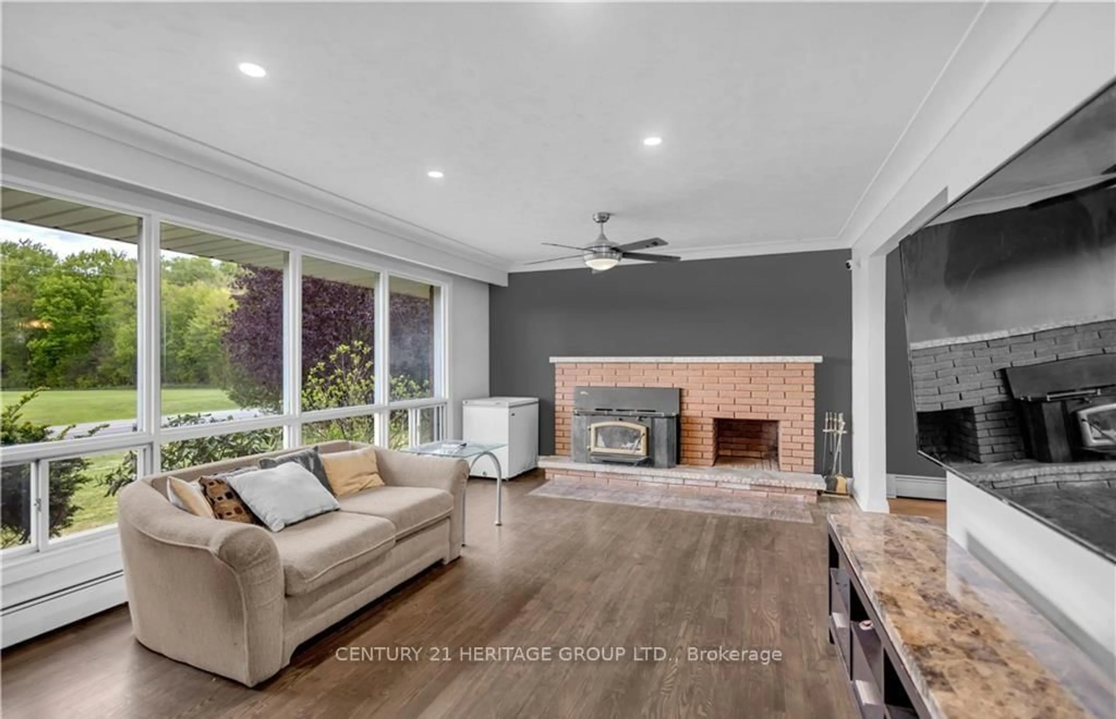 Living room with furniture, ceramic/tile floor for 348 Windham Road 12 Rd, Norfolk Ontario N3Y 4K6
