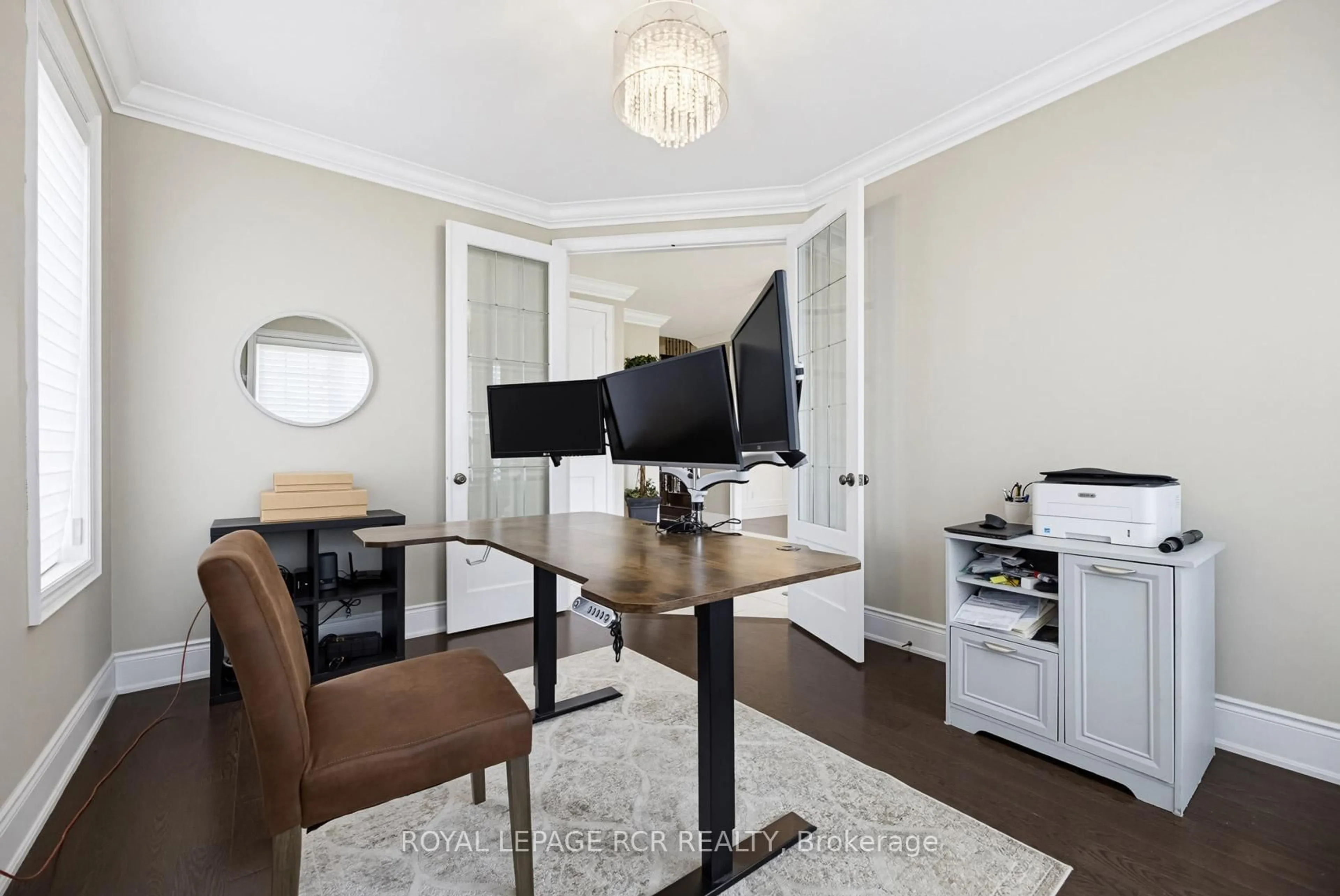 Living room with furniture, wood/laminate floor for 19 Skelton St, Mono Ontario L9W 6W9