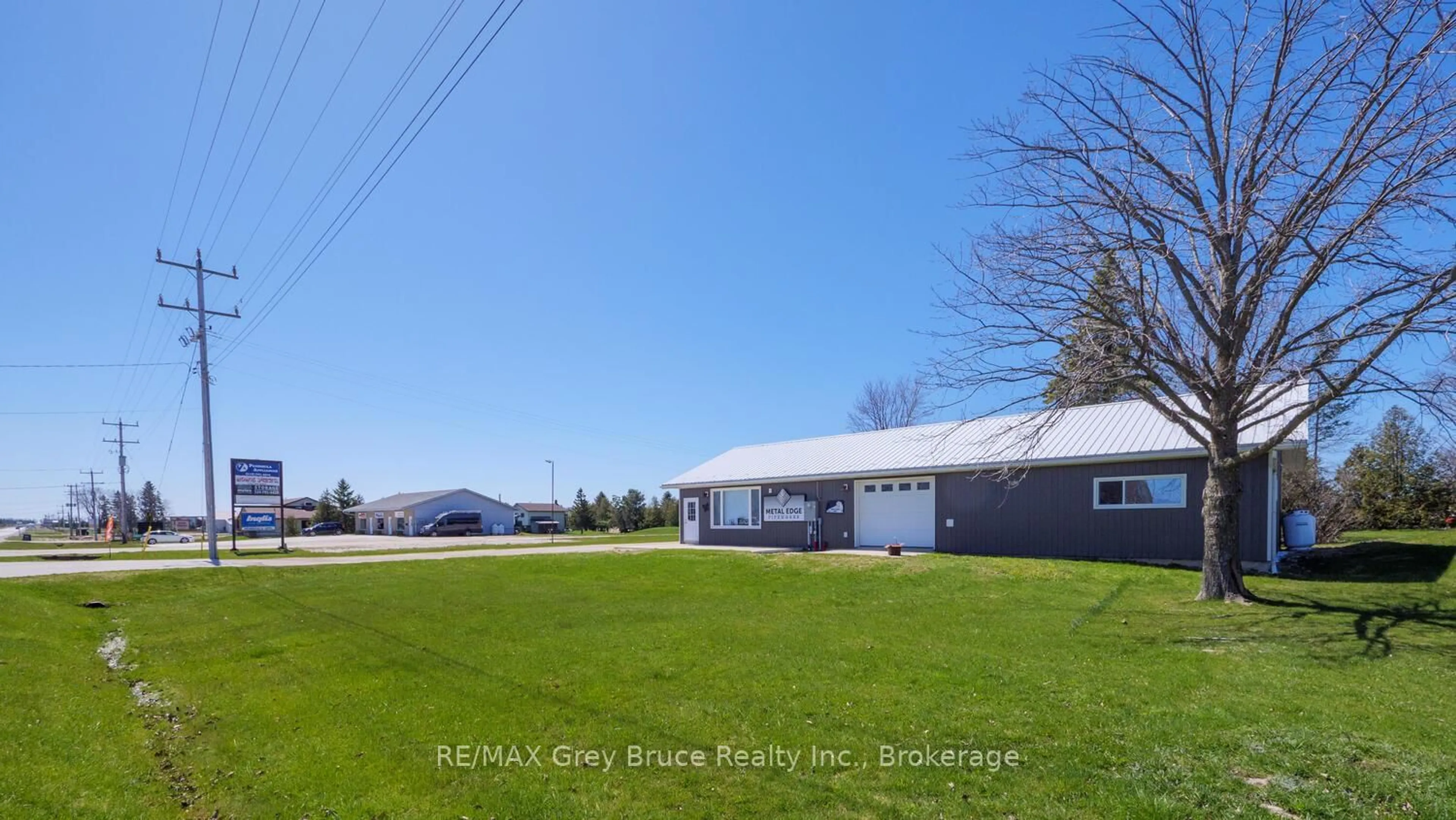 A pic from outside/outdoor area/front of a property/back of a property/a pic from drone, unknown for 2847 HIGHWAY 6, Northern Bruce Peninsula Ontario N0H 1W0