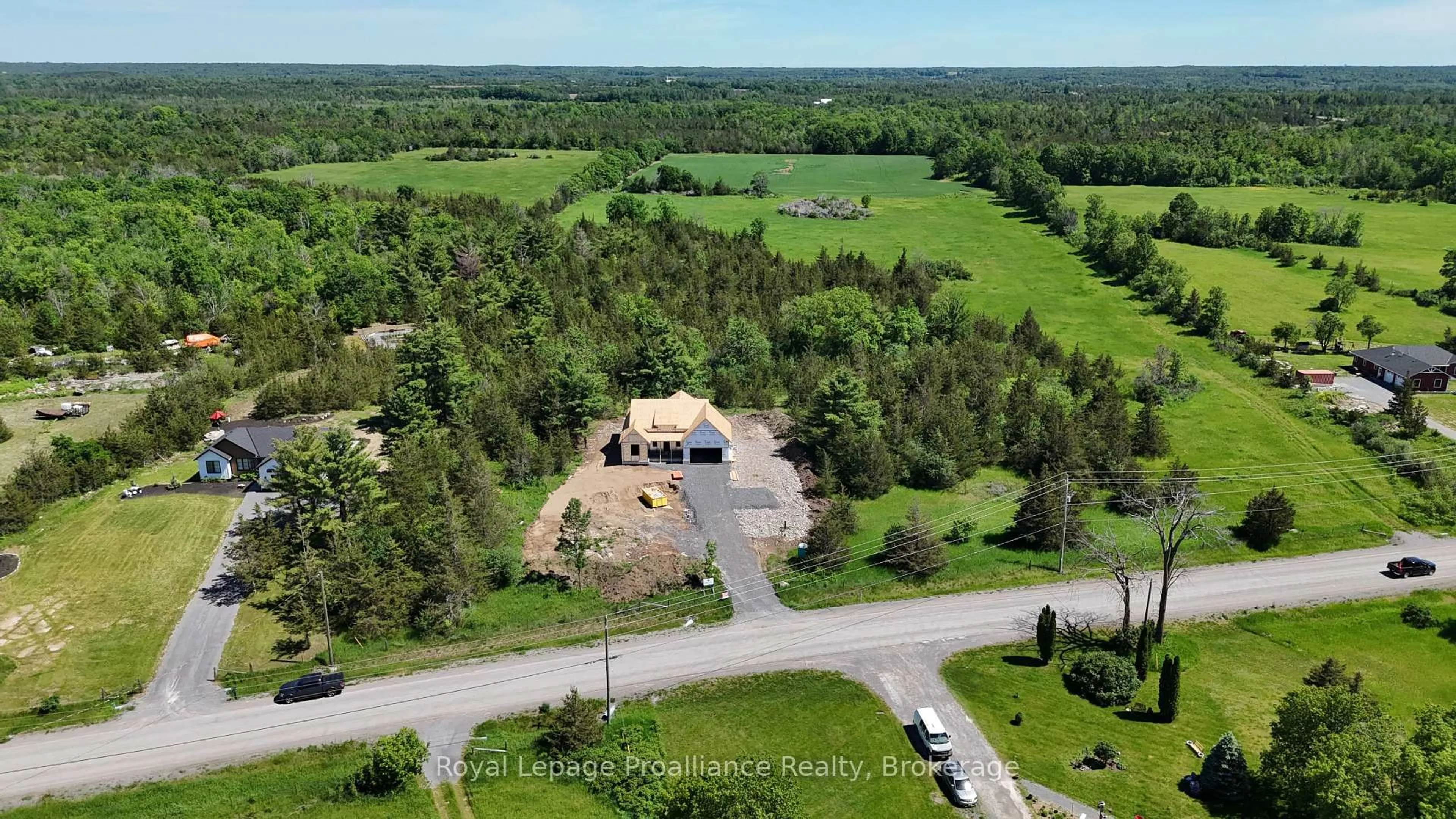 A pic from outside/outdoor area/front of a property/back of a property/a pic from drone, unknown for 102 Dewey Rd, Yarker Ontario K0K 3N0