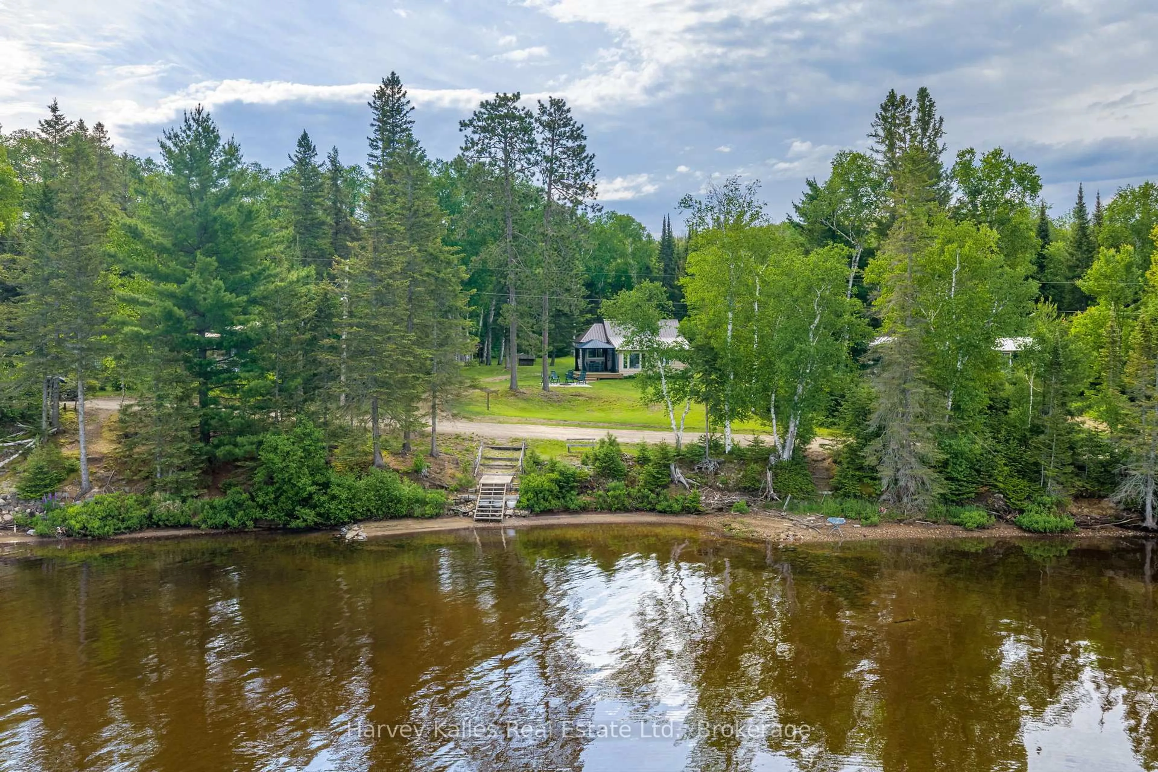 A pic from outside/outdoor area/front of a property/back of a property/a pic from drone, water/lake/river/ocean view for 73 Cashman Creek Rd, Kearney Ontario P0A 1M0