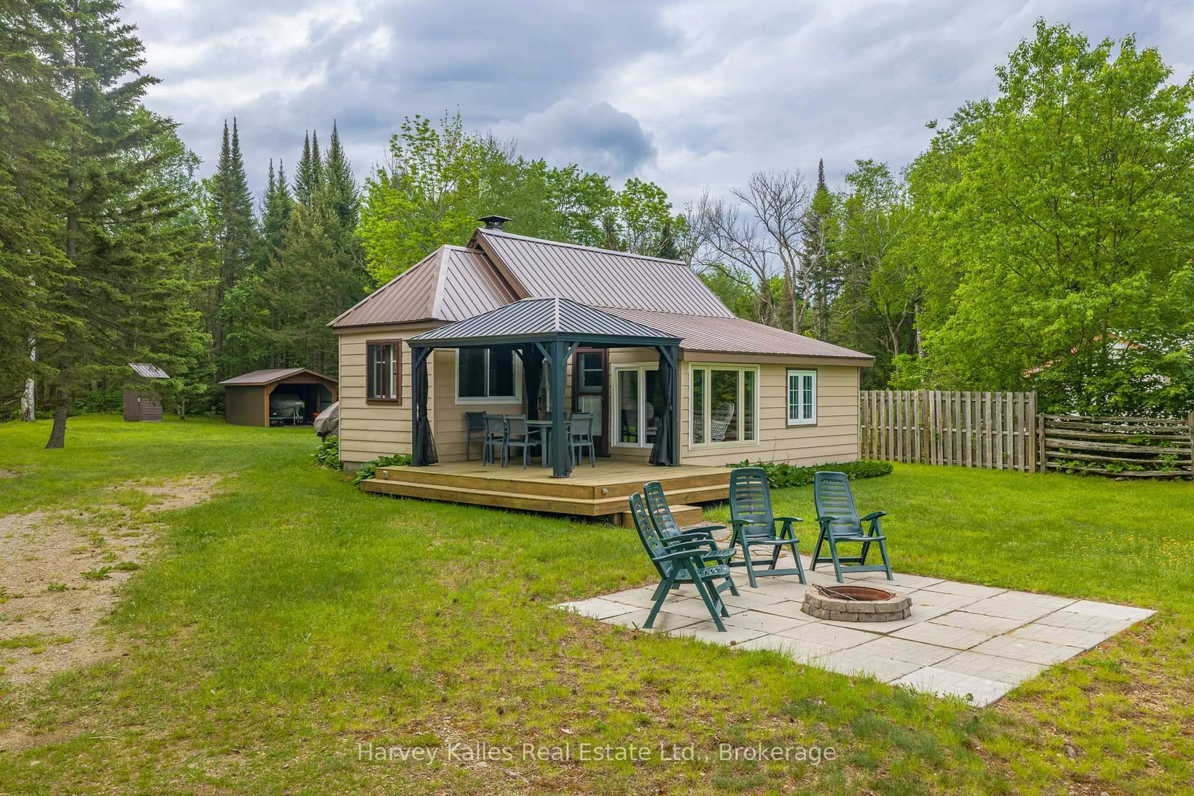 A pic from outside/outdoor area/front of a property/back of a property/a pic from drone, water/lake/river/ocean view for 73 Cashman Creek Rd, Kearney Ontario P0A 1M0