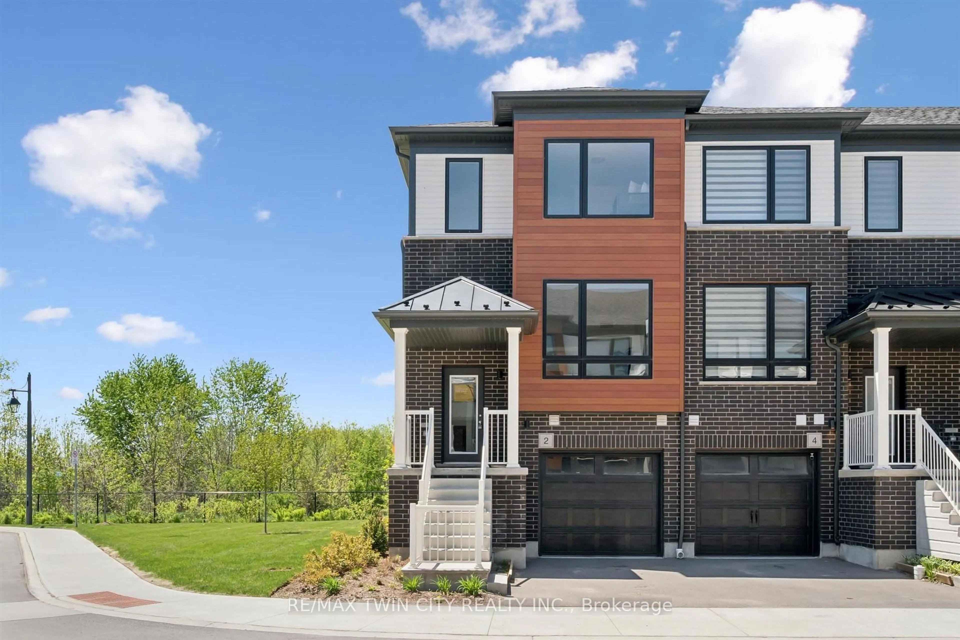 Home with brick exterior material, street for 2 Sora Lane, Guelph Ontario N1E 0T4