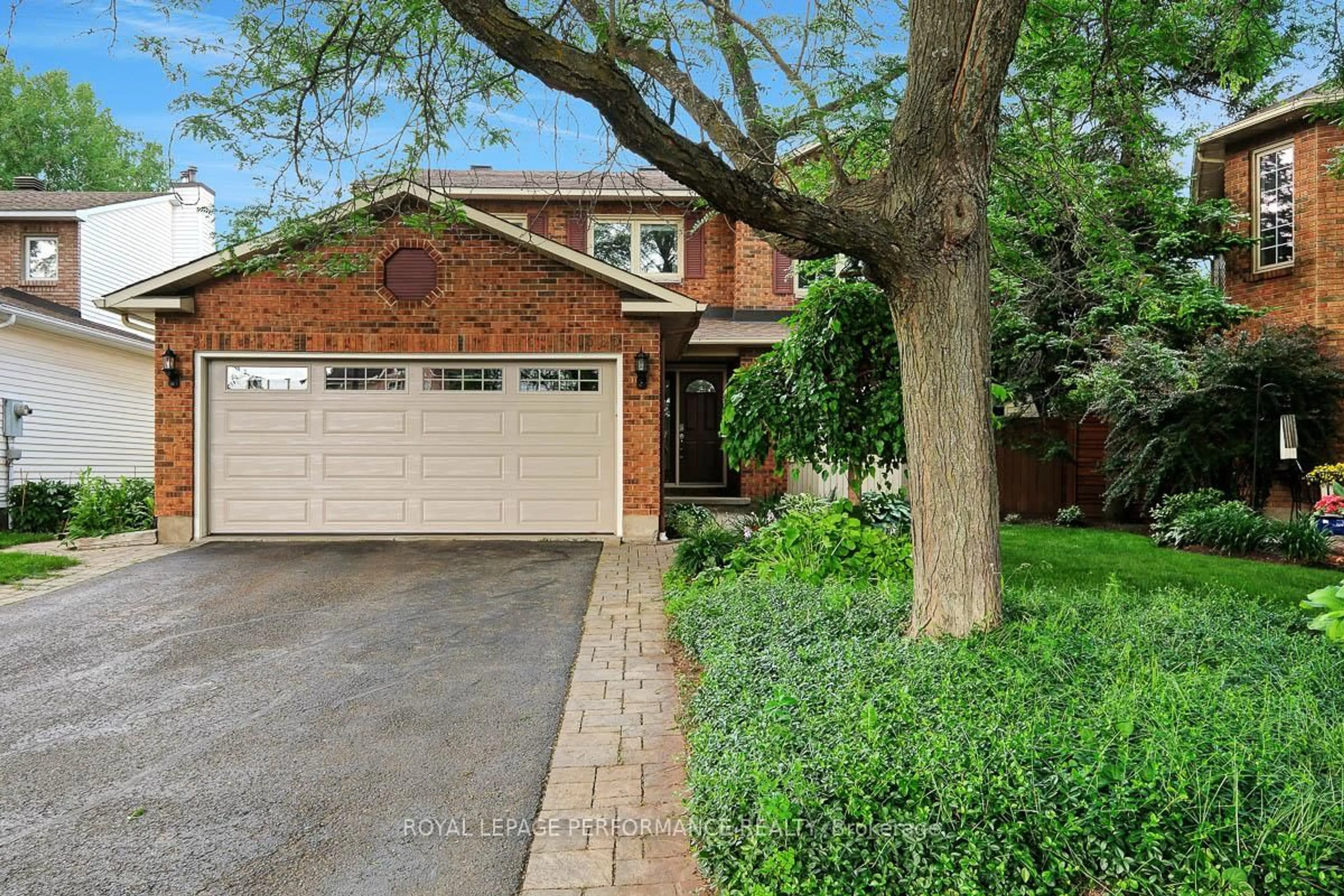 Home with brick exterior material, street for 1595 Champneuf Dr, Orleans Ontario K1C 6B6