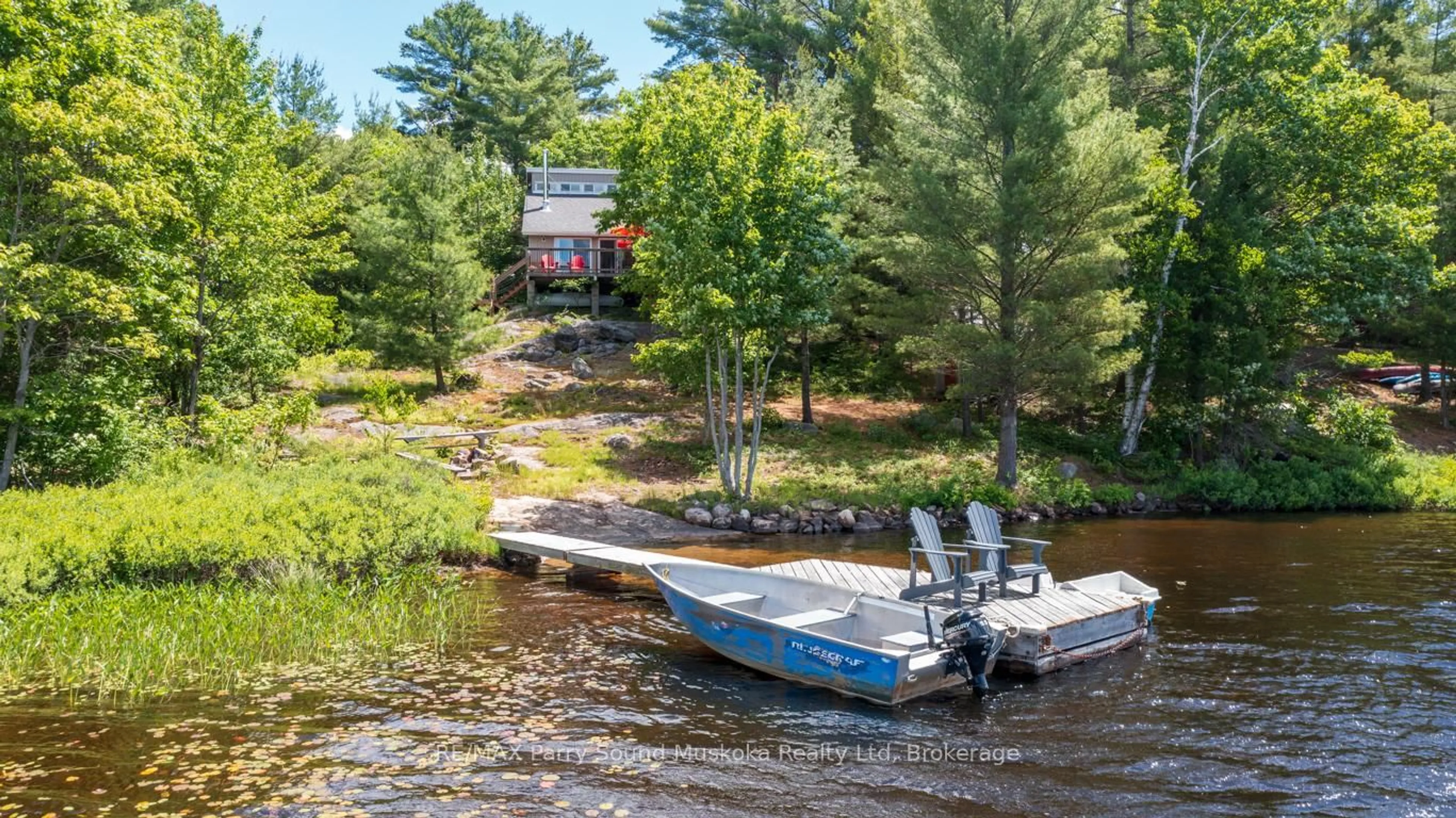 A pic from outside/outdoor area/front of a property/back of a property/a pic from drone, water/lake/river/ocean view for 54-56 Shebeshekong Estates Rd, Carling Ontario P0G 1G0