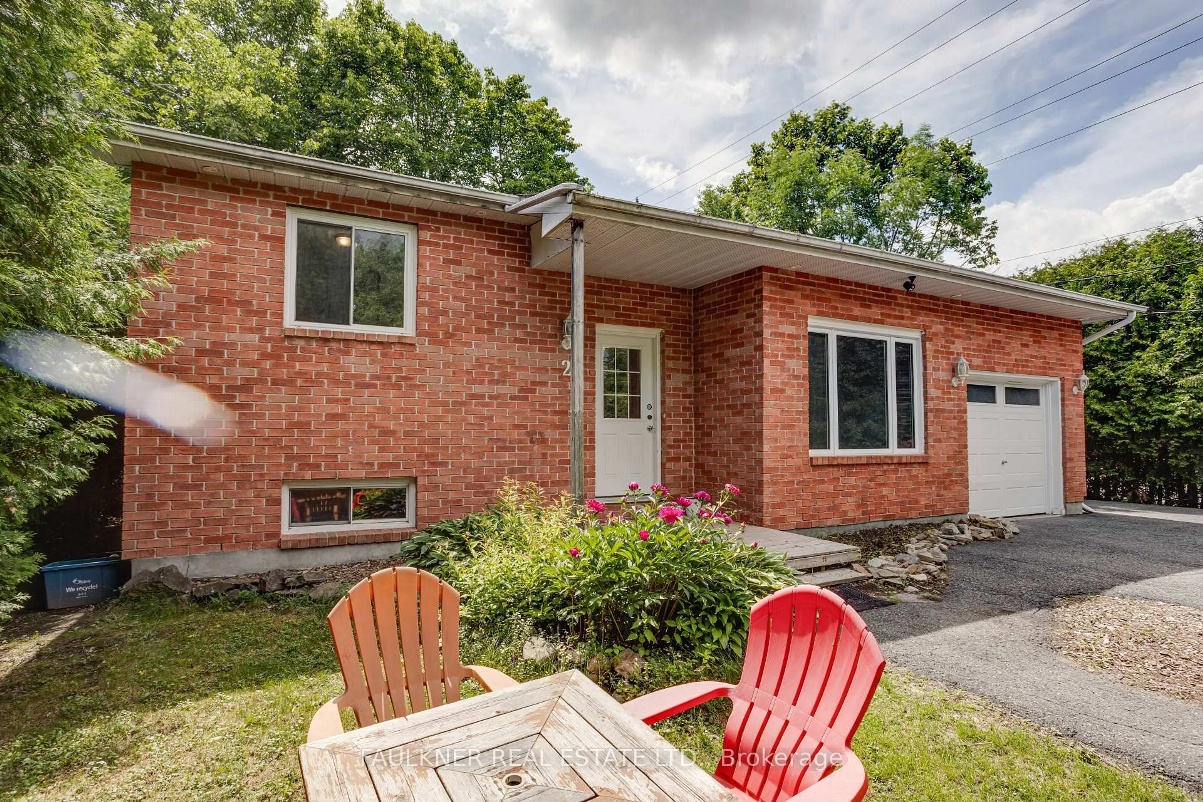 Home with brick exterior material, street for 2 Caribou Ave, Stittsville Ontario K2S 1M5