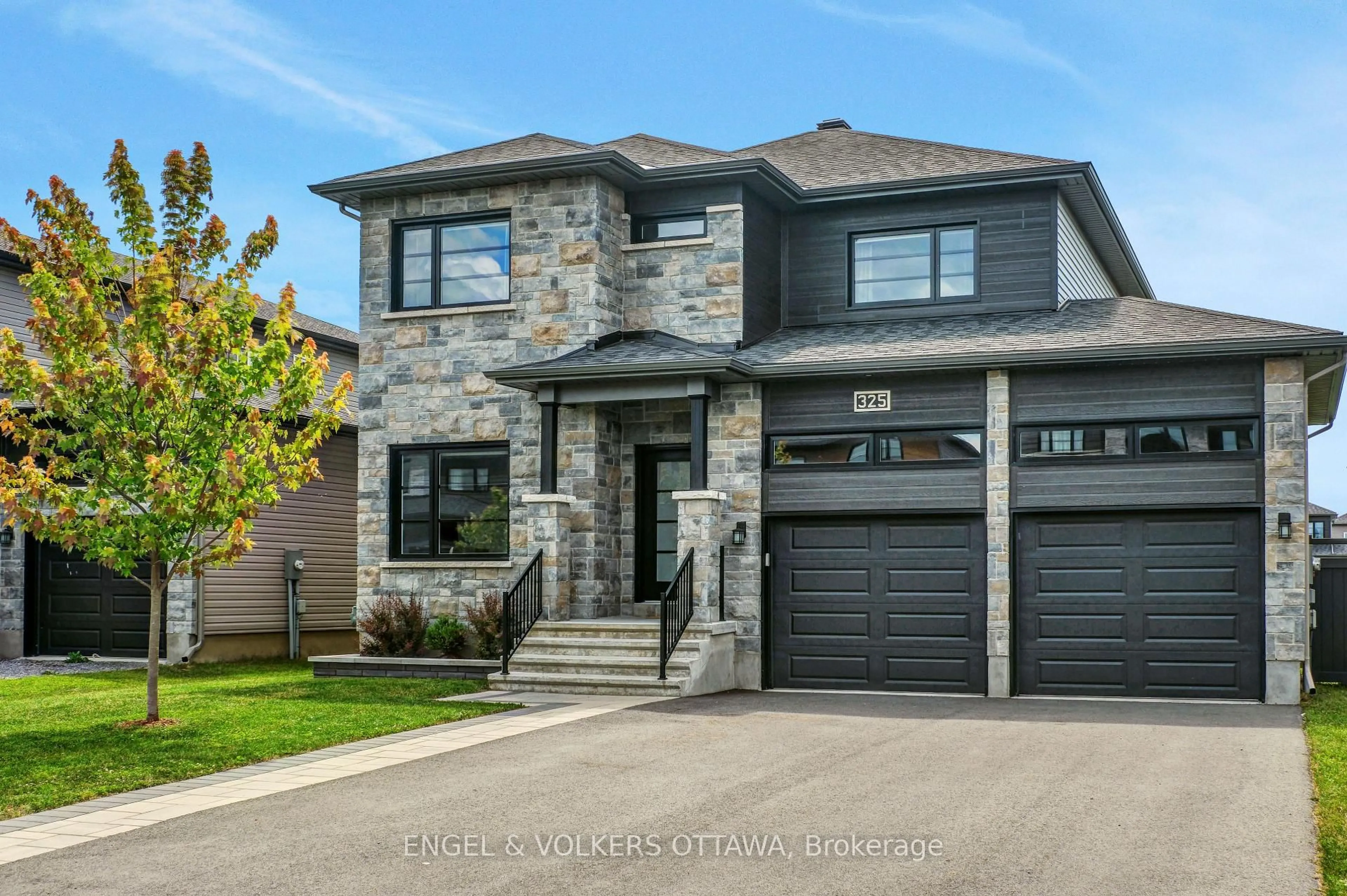 Home with brick exterior material, street for 325 Moonlight Dr, Russell Ontario K4R 0L1