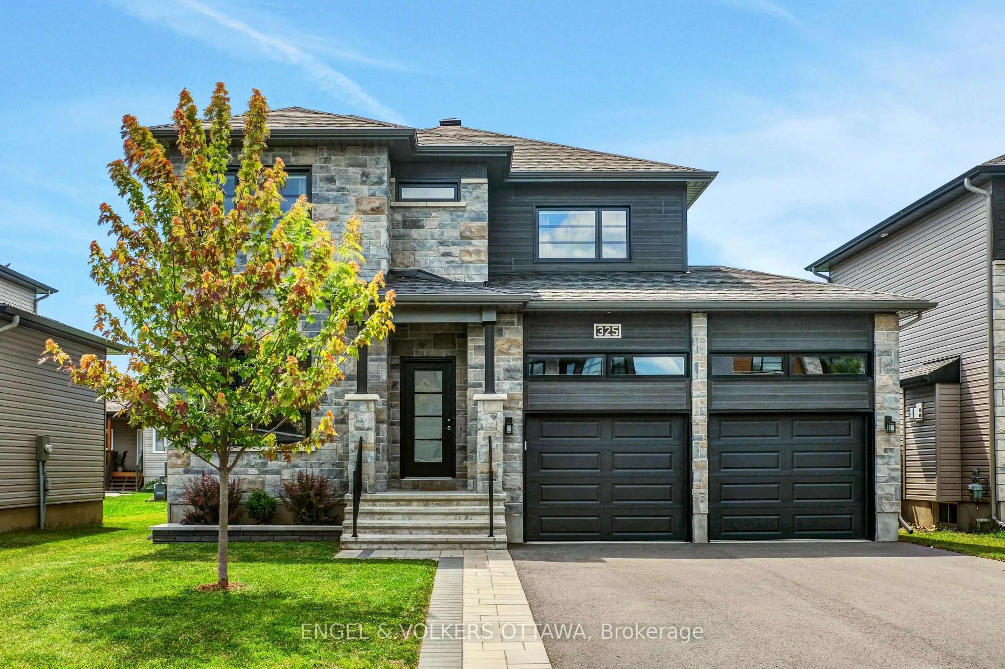 Home with brick exterior material, street for 325 Moonlight Dr, Russell Ontario K4R 0L1