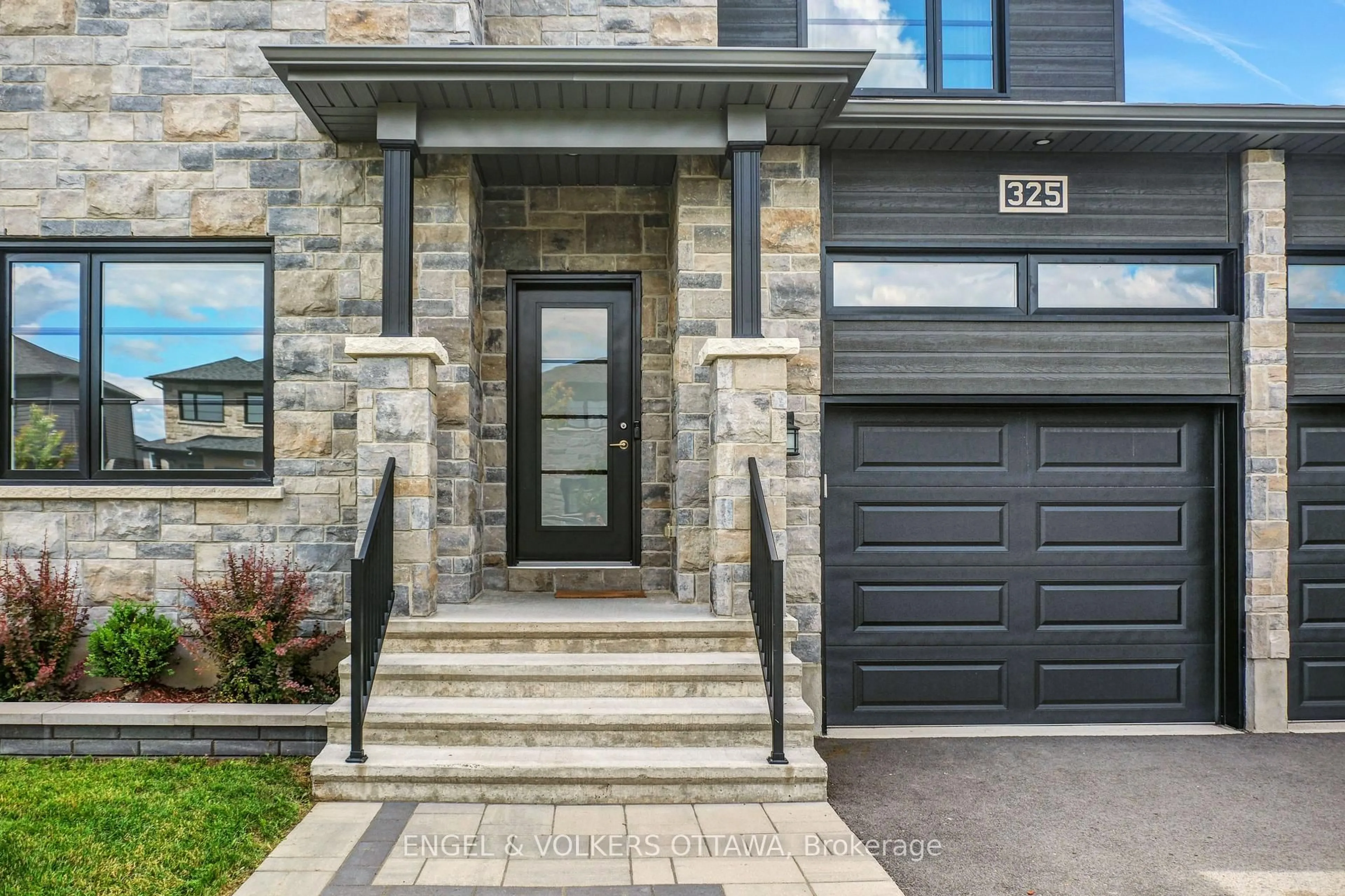 Home with brick exterior material, street for 325 Moonlight Dr, Russell Ontario K4R 0L1