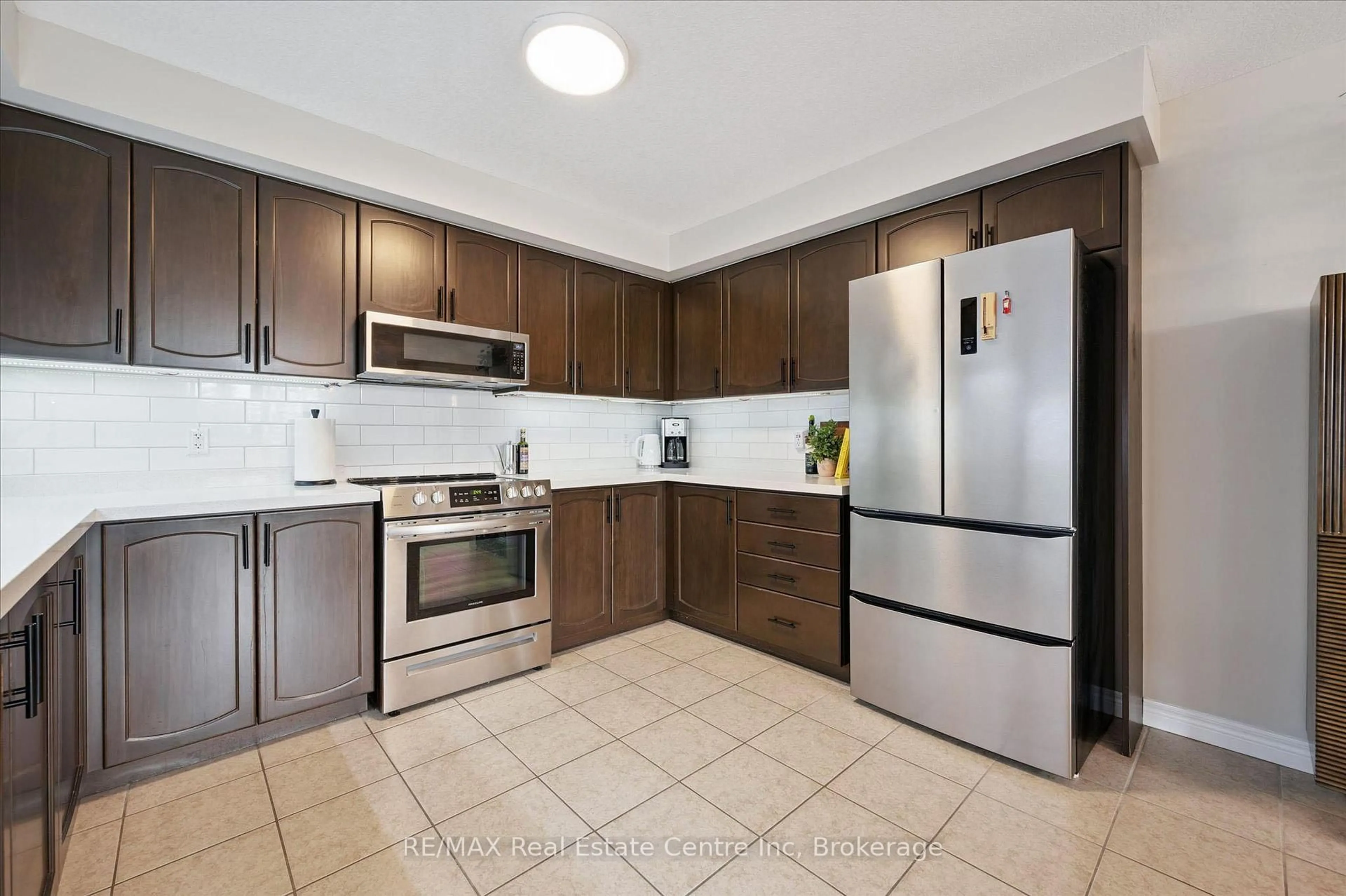 Standard kitchen, ceramic/tile floor for 904 Paisley Rd #202, Guelph Ontario N1K 0C6