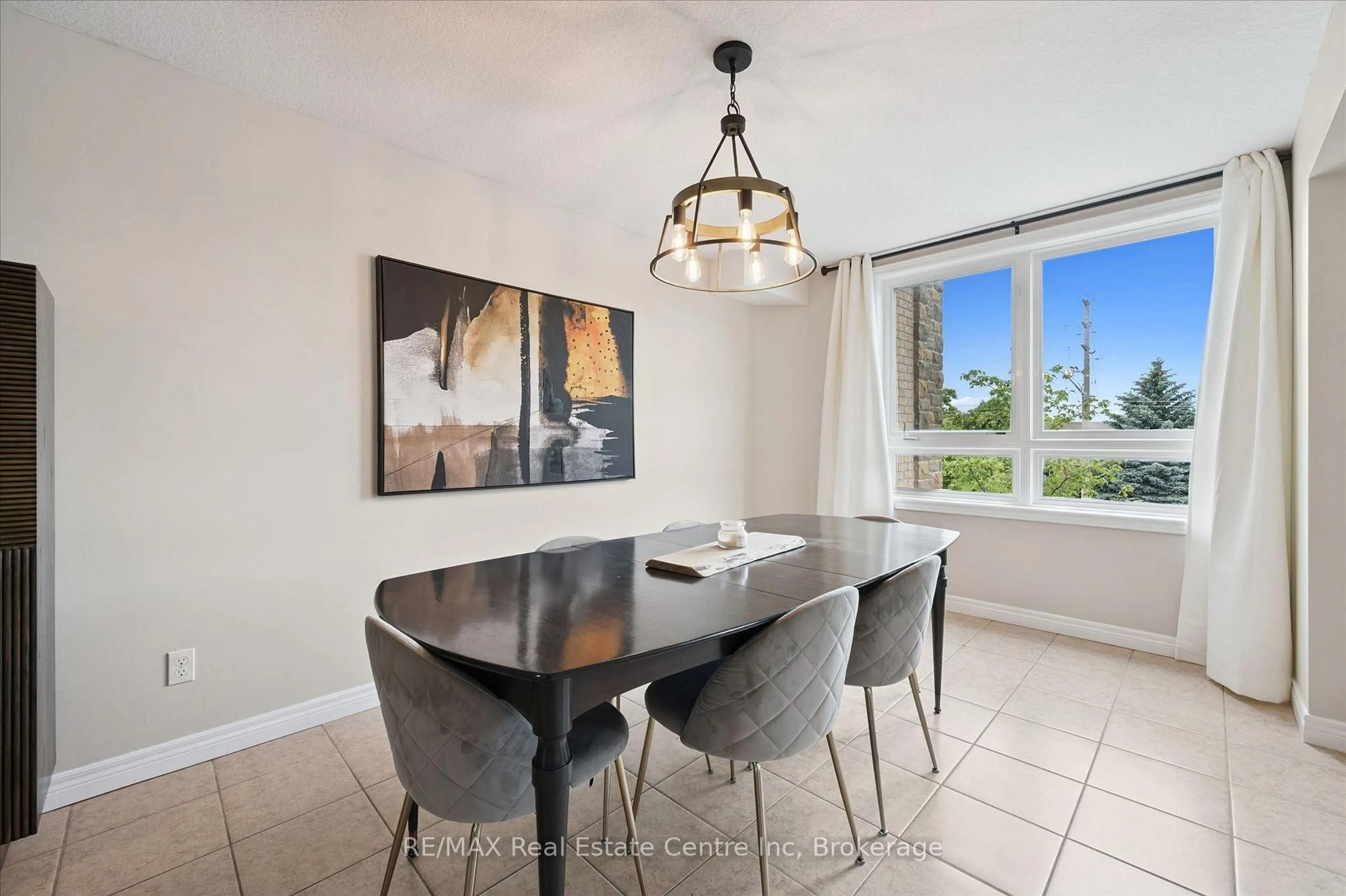 Dining room, ceramic/tile floor for 904 Paisley Rd #202, Guelph Ontario N1K 0C6