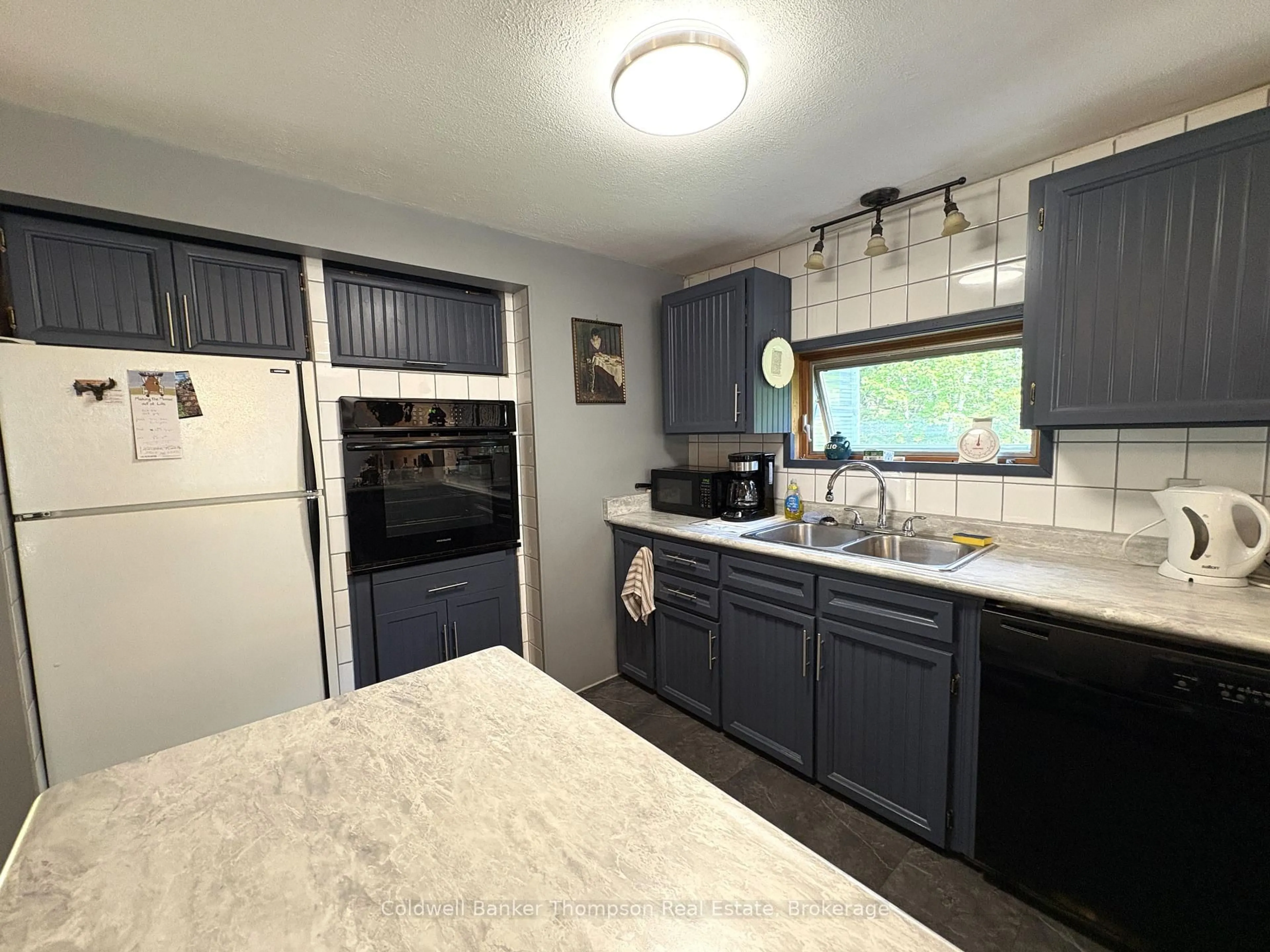 Open concept kitchen, unknown for 273 Simpson's Hill Rd, Machar Ontario P0A 1X0