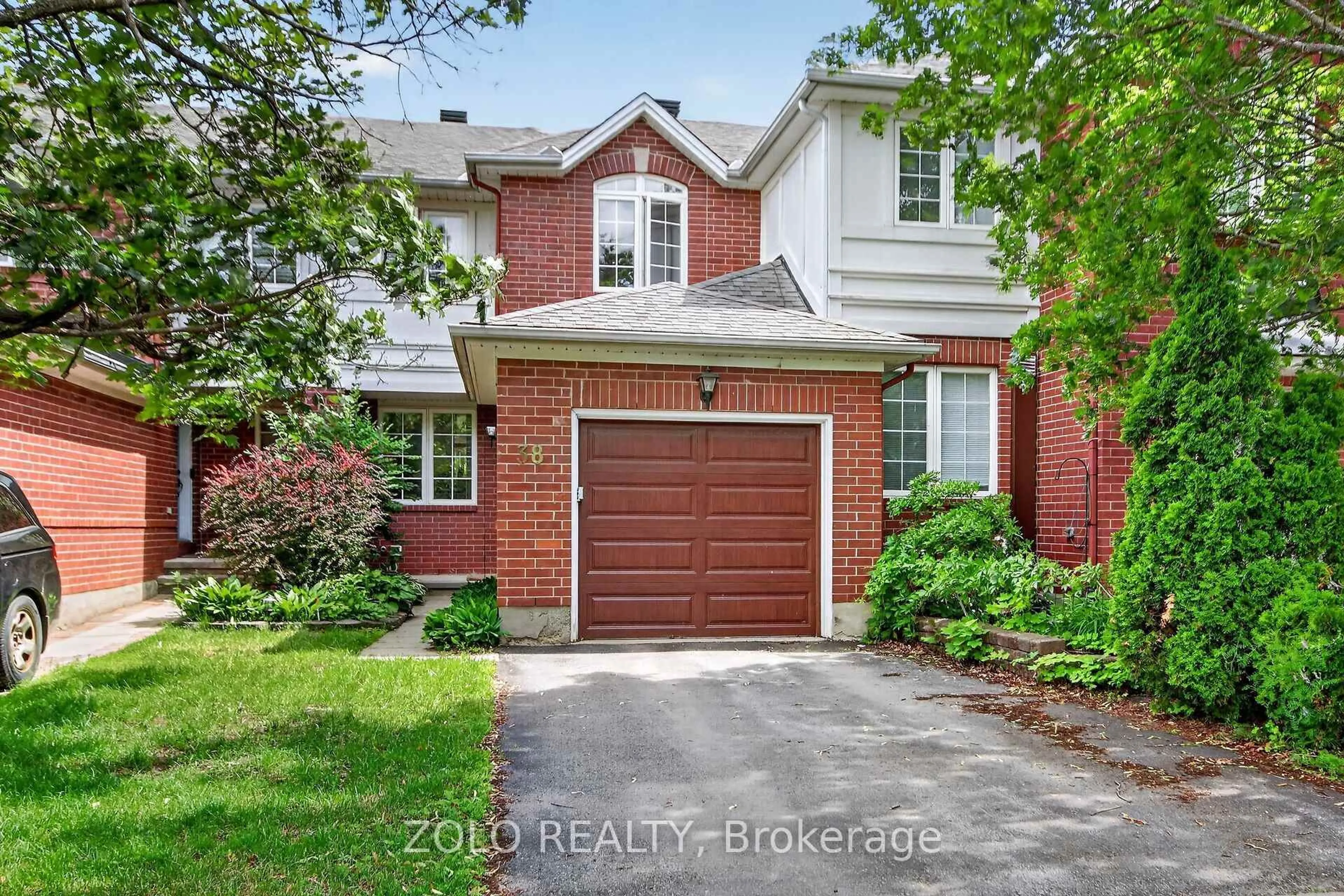 Home with brick exterior material, street for 38 Central Park Dr, Ottawa Ontario K2C 4A3