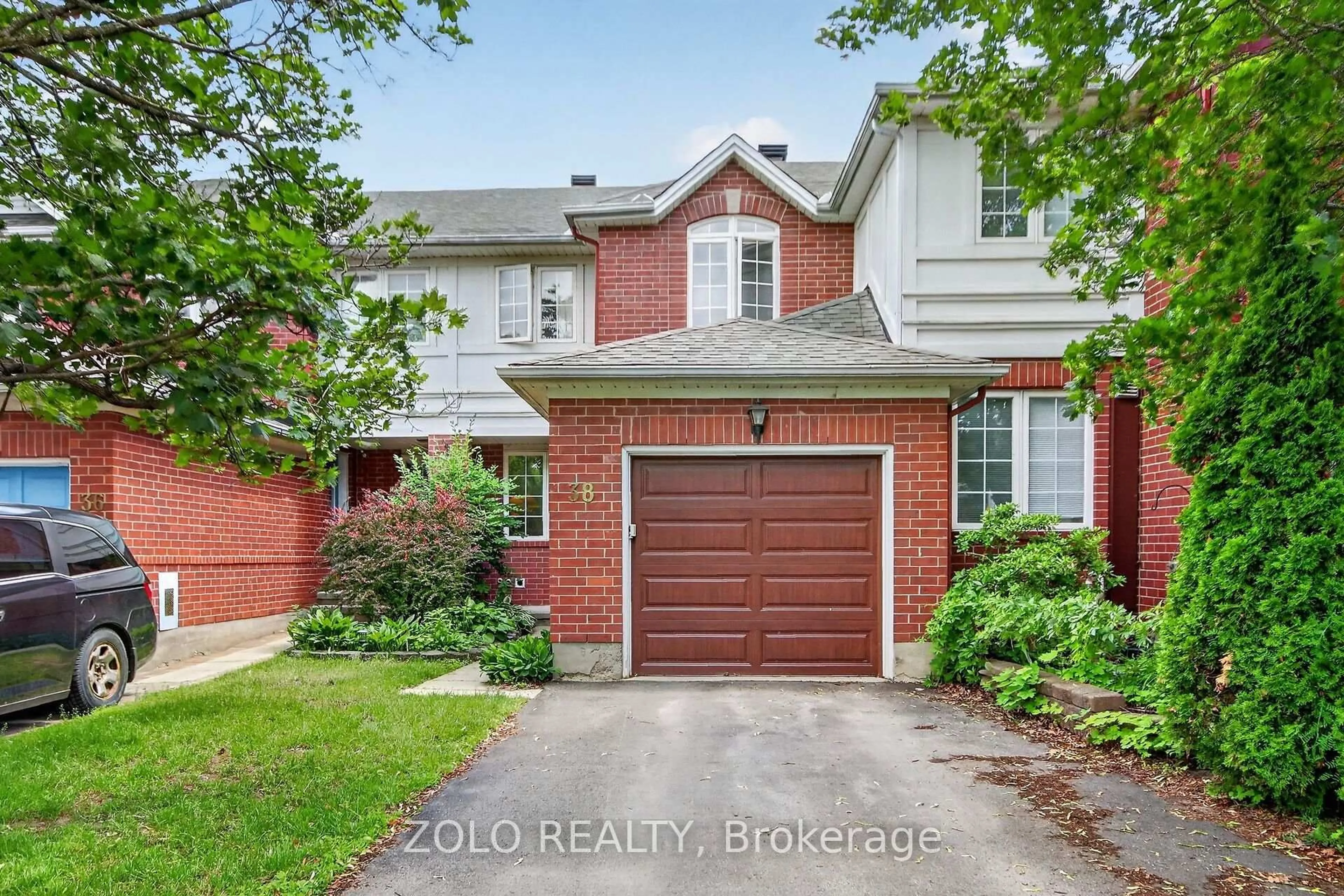 Home with brick exterior material, street for 38 Central Park Dr, Ottawa Ontario K2C 4A3