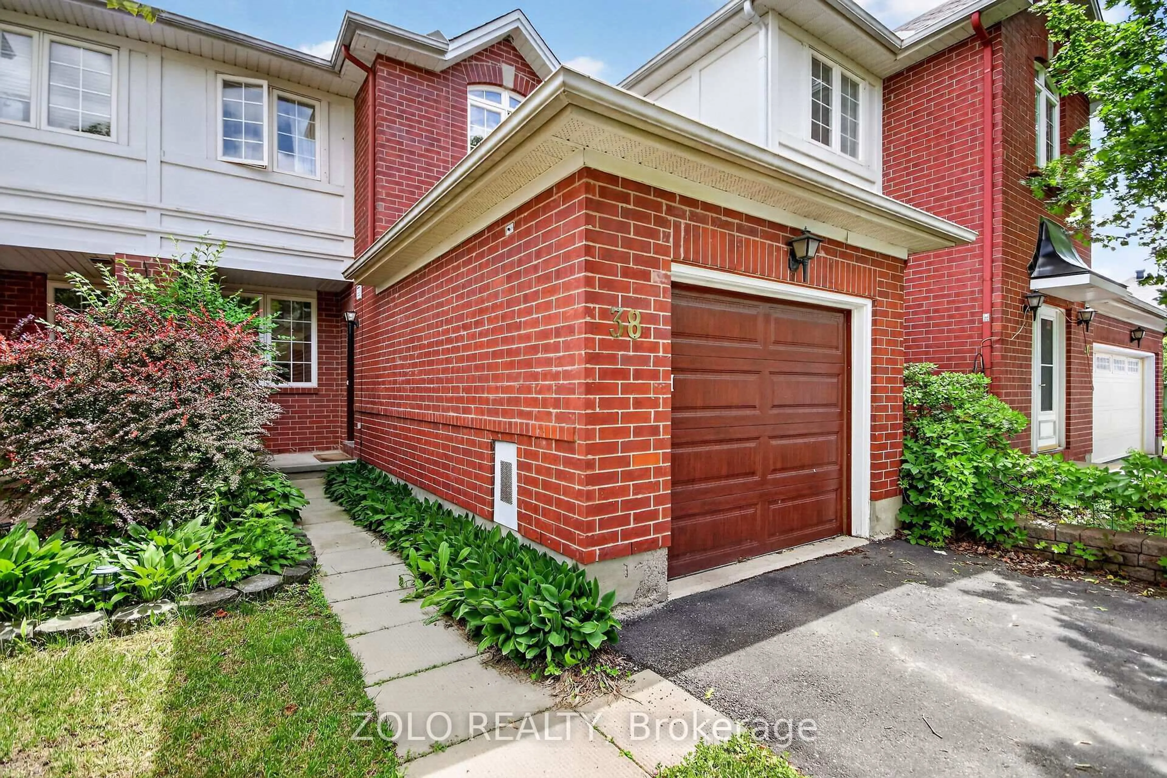 Home with brick exterior material, street for 38 Central Park Dr, Ottawa Ontario K2C 4A3