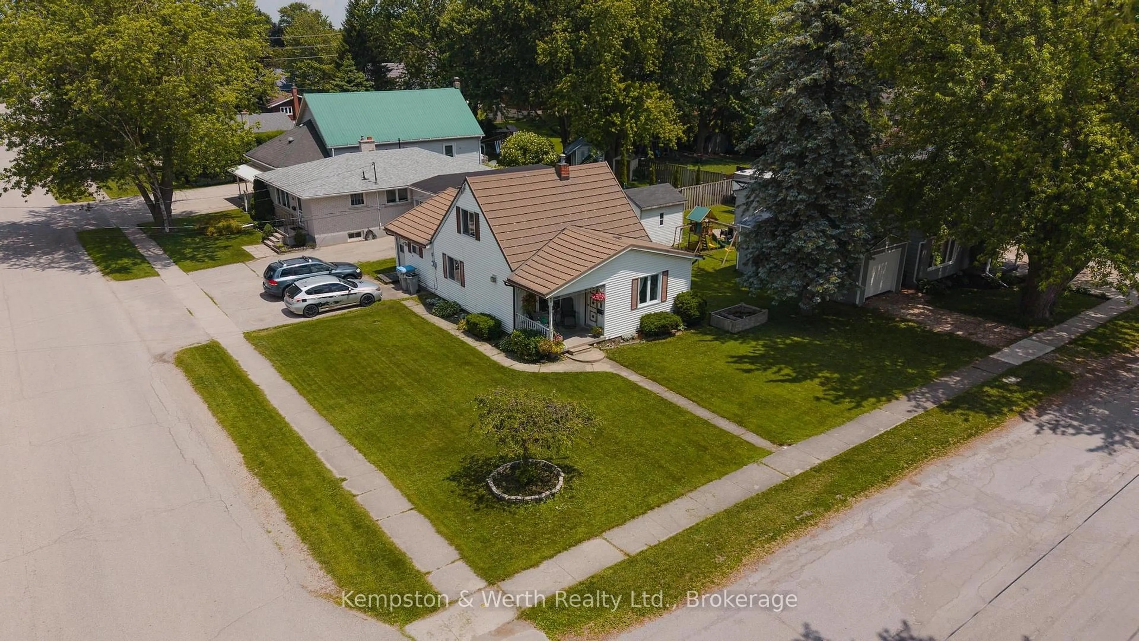 A pic from outside/outdoor area/front of a property/back of a property/a pic from drone, street for 605 Inkerman St, North Perth Ontario N4W 2N9