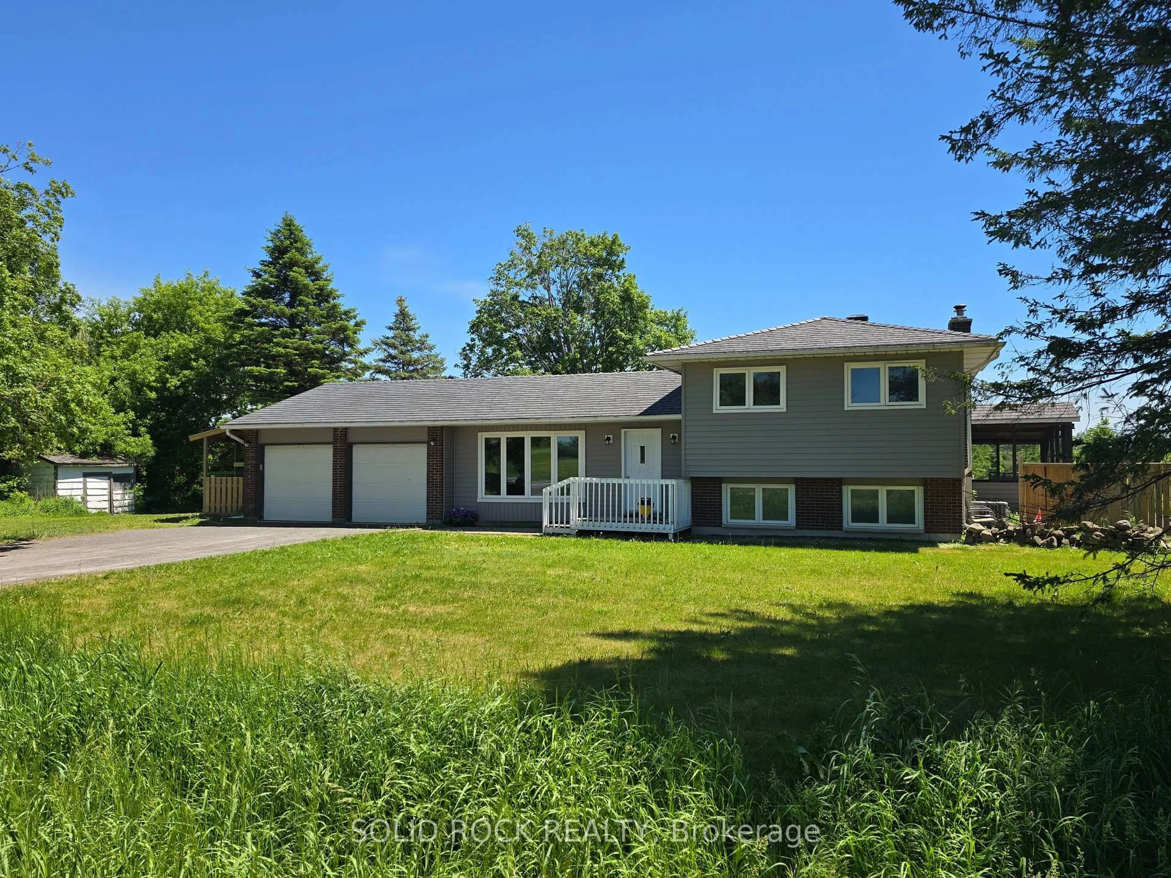 A pic from outside/outdoor area/front of a property/back of a property/a pic from drone, street for 1934 Carsonby Rd, North Gower Ontario K0A 2T0