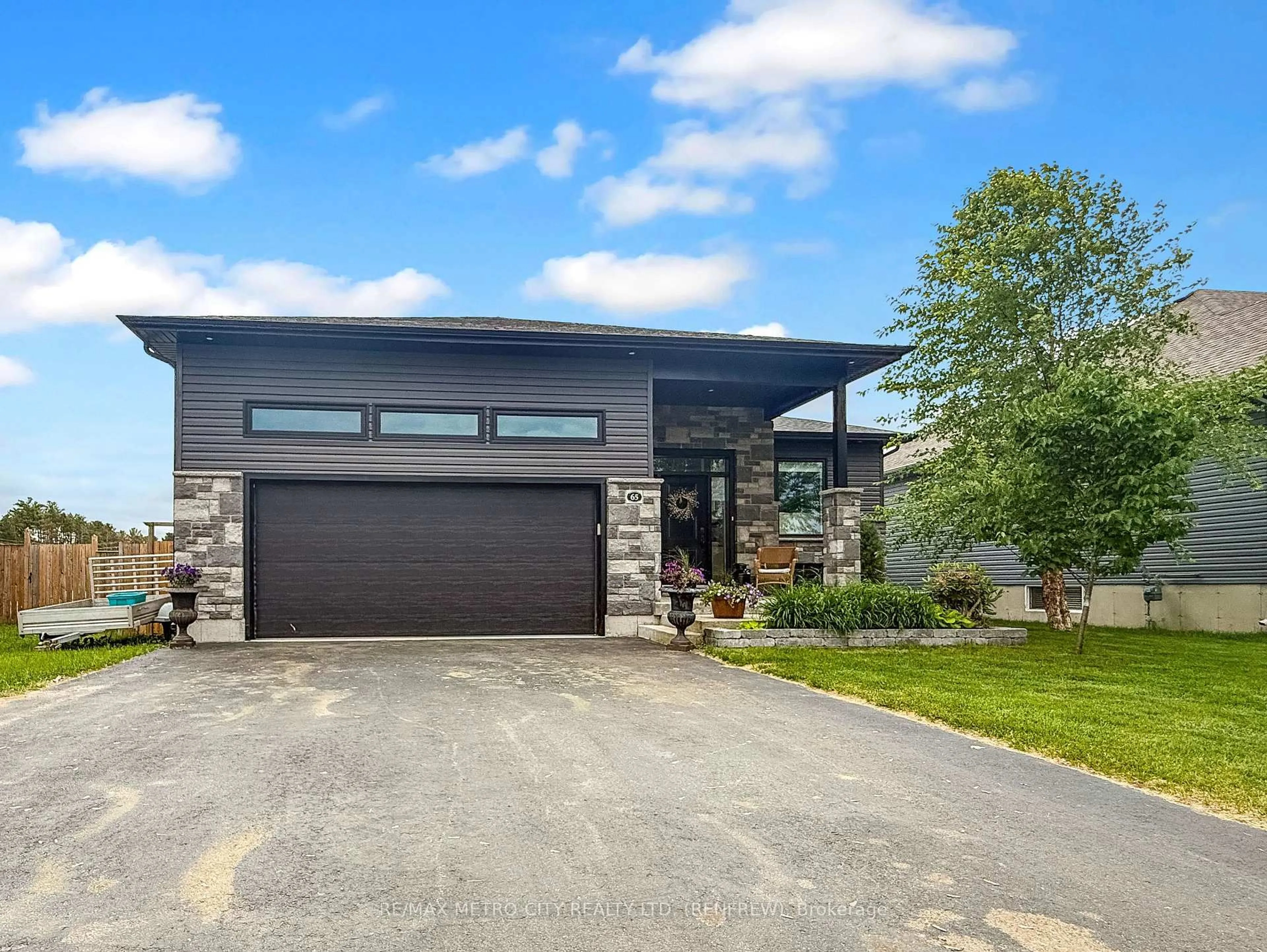 Home with brick exterior material, street for 65 Noble Cres, Petawawa Ontario K8H 0G1