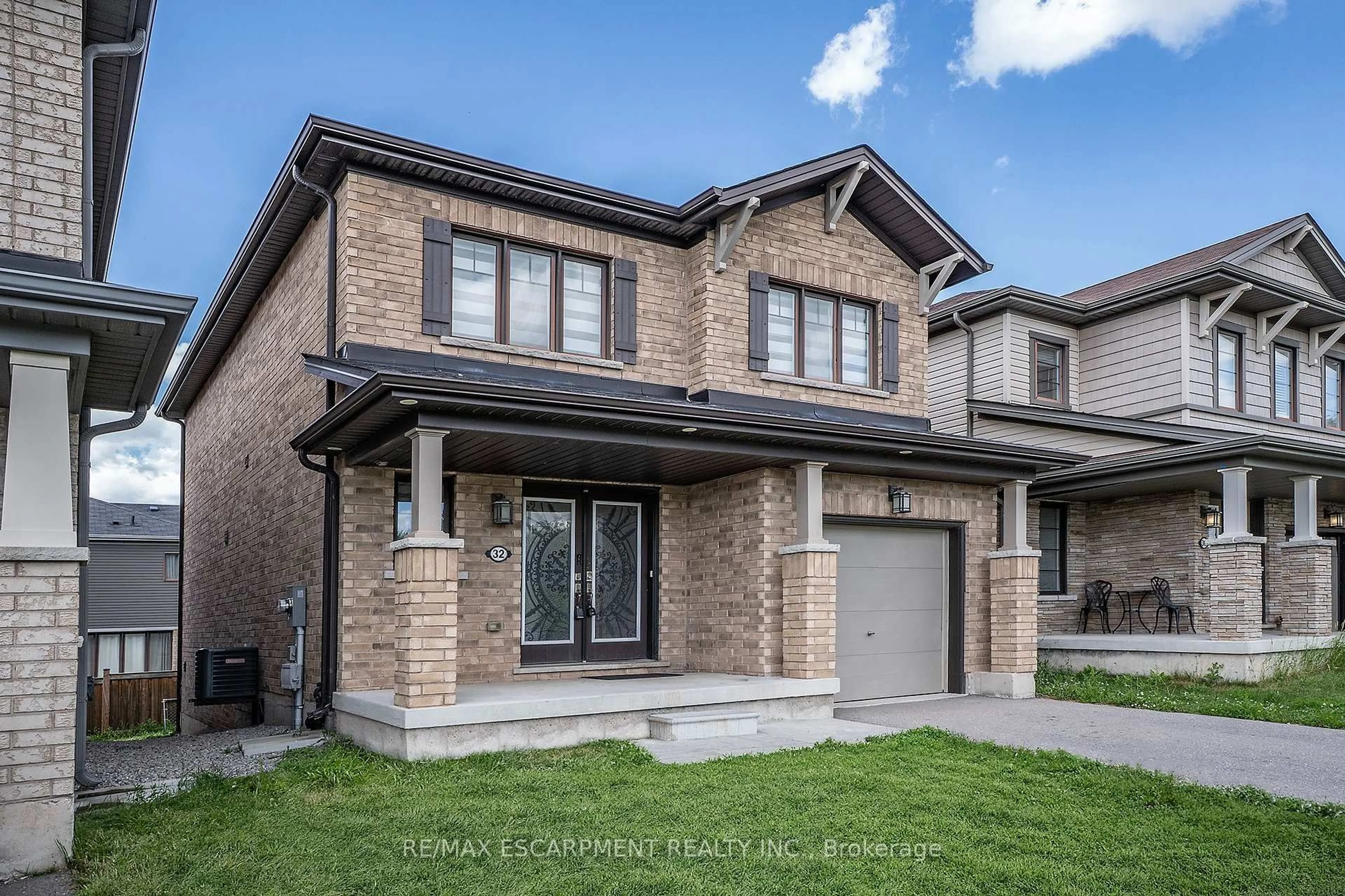 Home with brick exterior material, street for 32 Hedges Cres, Hamilton Ontario L8J 1X5