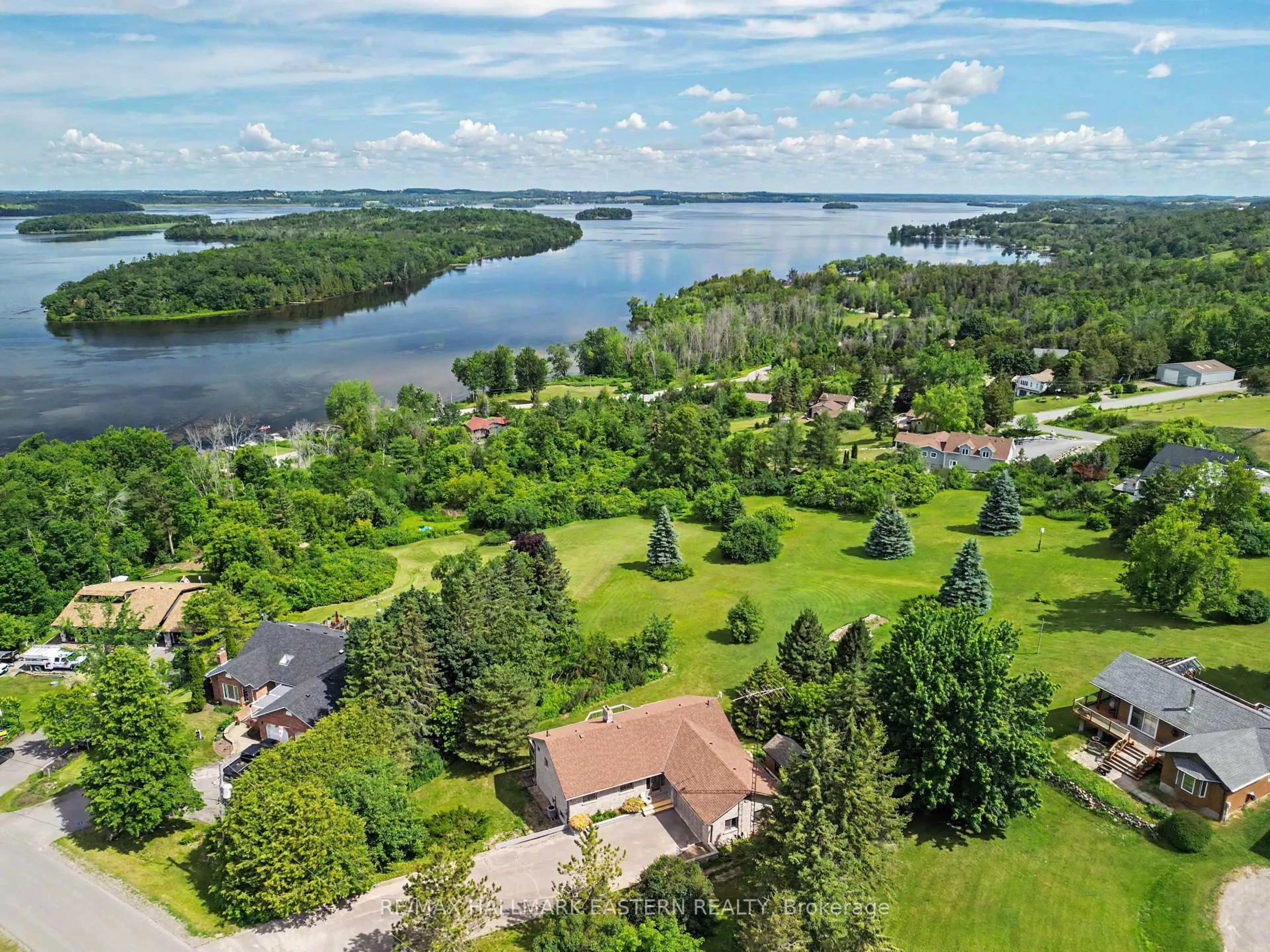 A pic from outside/outdoor area/front of a property/back of a property/a pic from drone, water/lake/river/ocean view for 473 Sunset Cres, Alnwick/Haldimand Ontario K0K 2X0