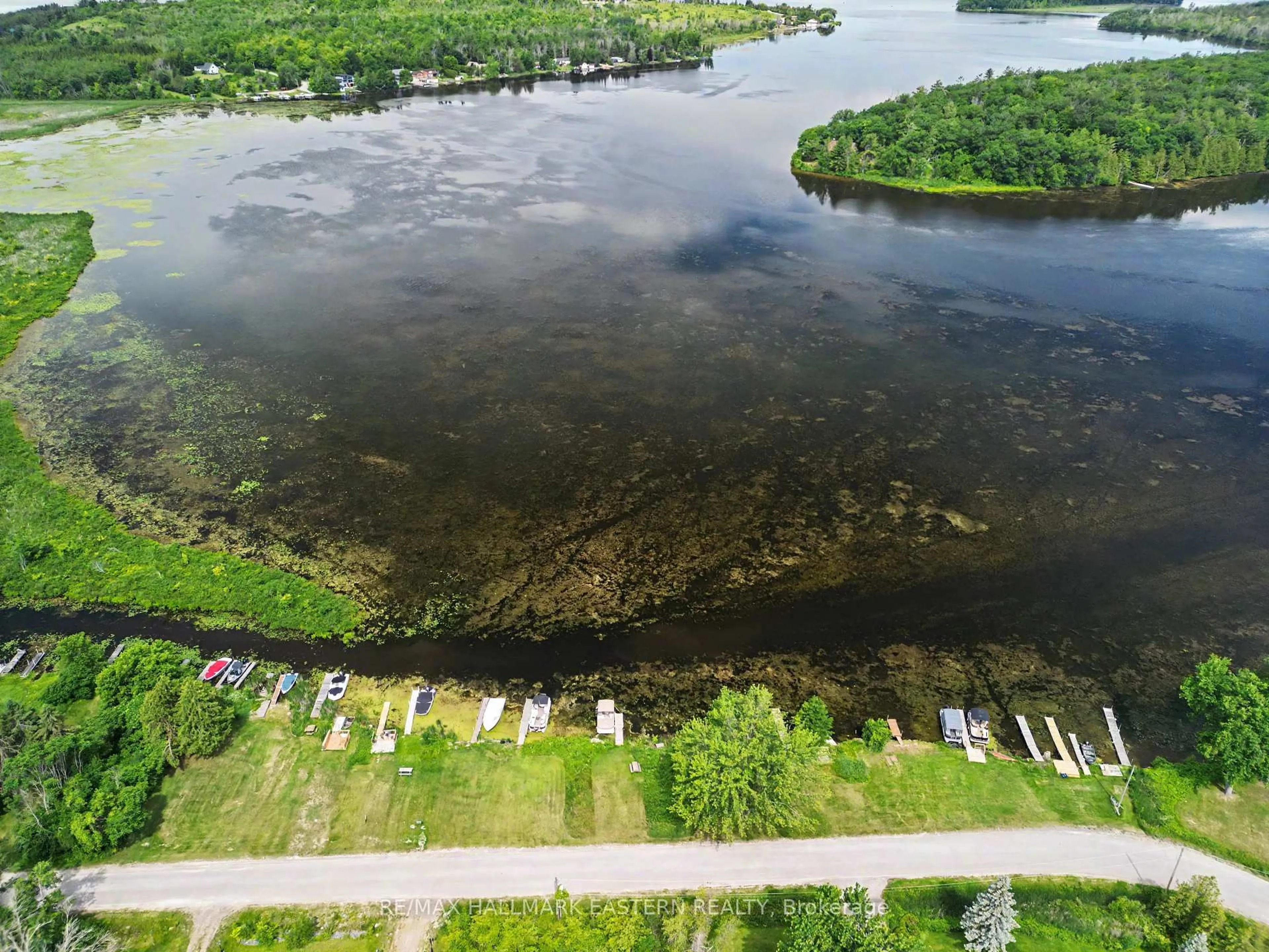 A pic from outside/outdoor area/front of a property/back of a property/a pic from drone, water/lake/river/ocean view for 473 Sunset Cres, Alnwick/Haldimand Ontario K0K 2X0