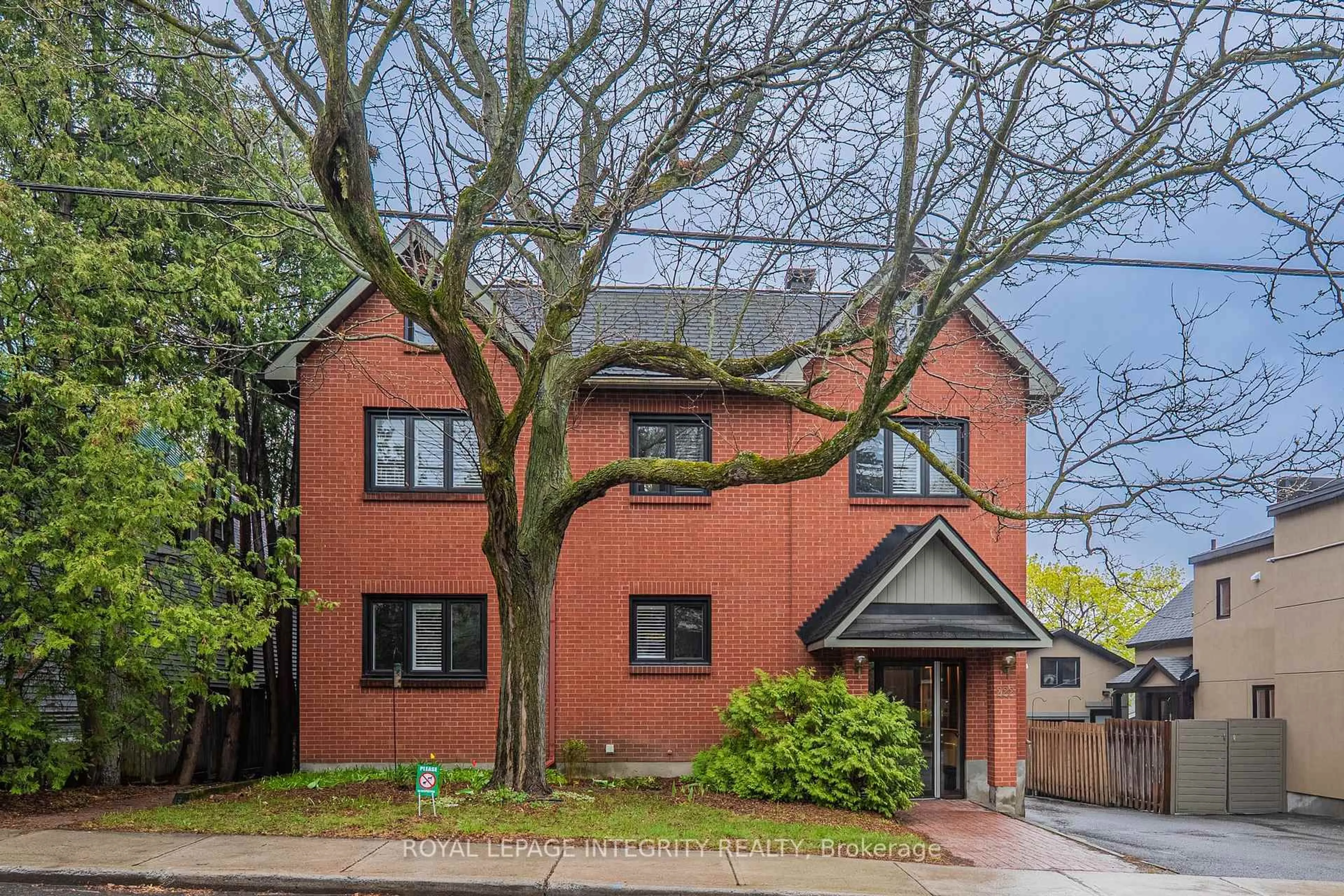 Home with brick exterior material, street for 222 Russell Ave #103, Ottawa Ontario K1N 7X5