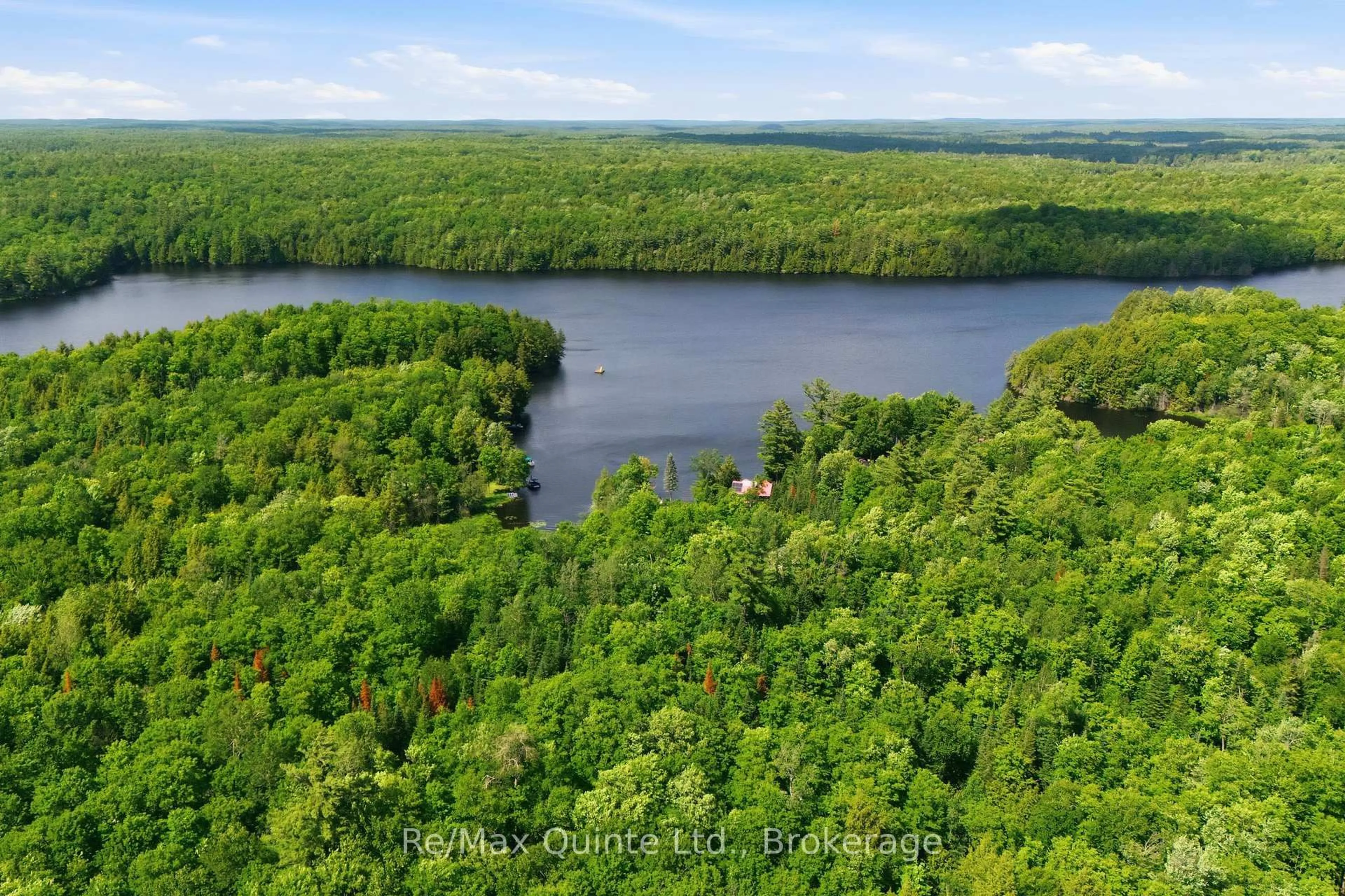 A pic from outside/outdoor area/front of a property/back of a property/a pic from drone, water/lake/river/ocean view for 485 Glanmire Lake Lane, Madoc Ontario K0K 1Y0