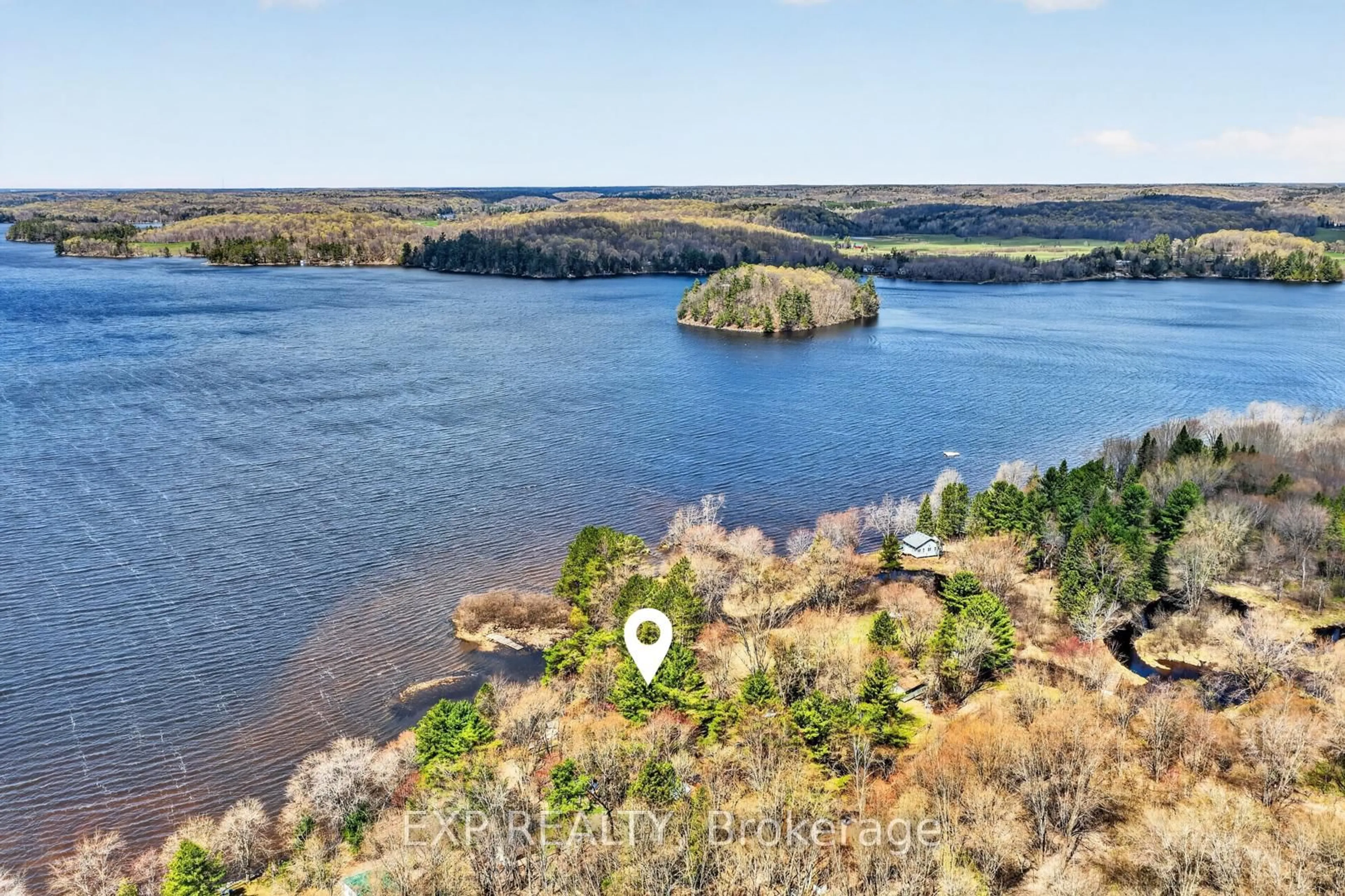 A pic from outside/outdoor area/front of a property/back of a property/a pic from drone, water/lake/river/ocean view for 1039 Wonder Beach Rd, Muskoka Lakes Ontario P0B 1M0