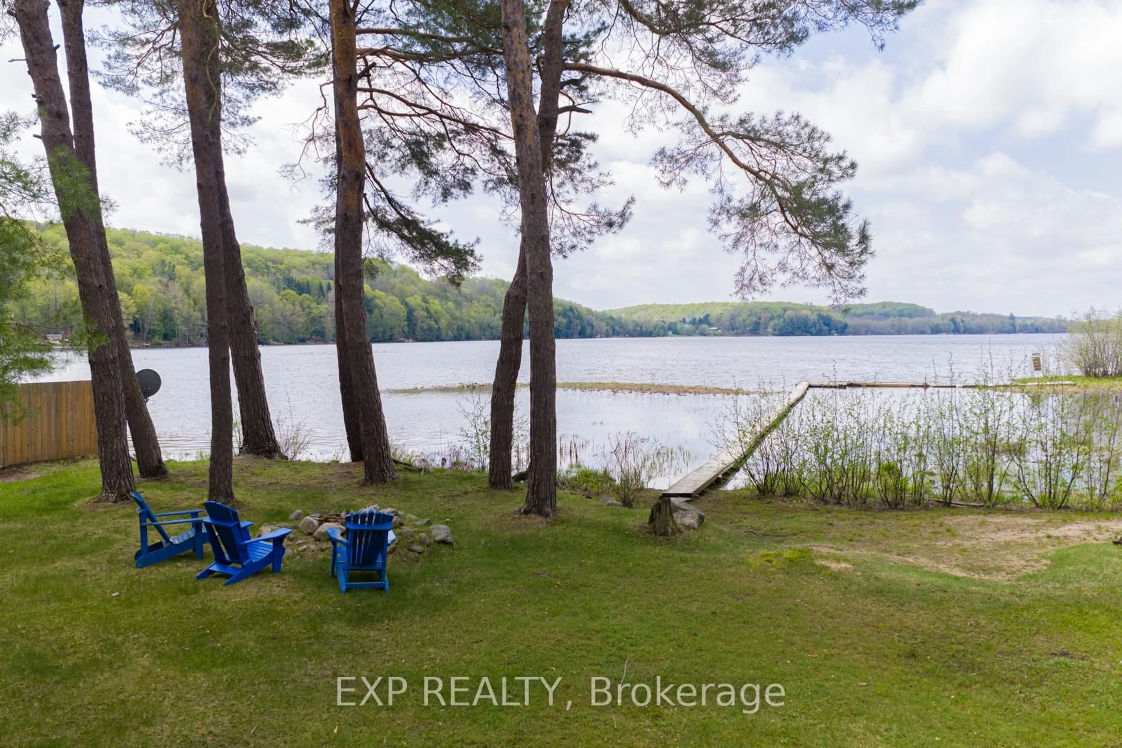 A pic from outside/outdoor area/front of a property/back of a property/a pic from drone, water/lake/river/ocean view for 1039 Wonder Beach Rd, Muskoka Lakes Ontario P0B 1M0