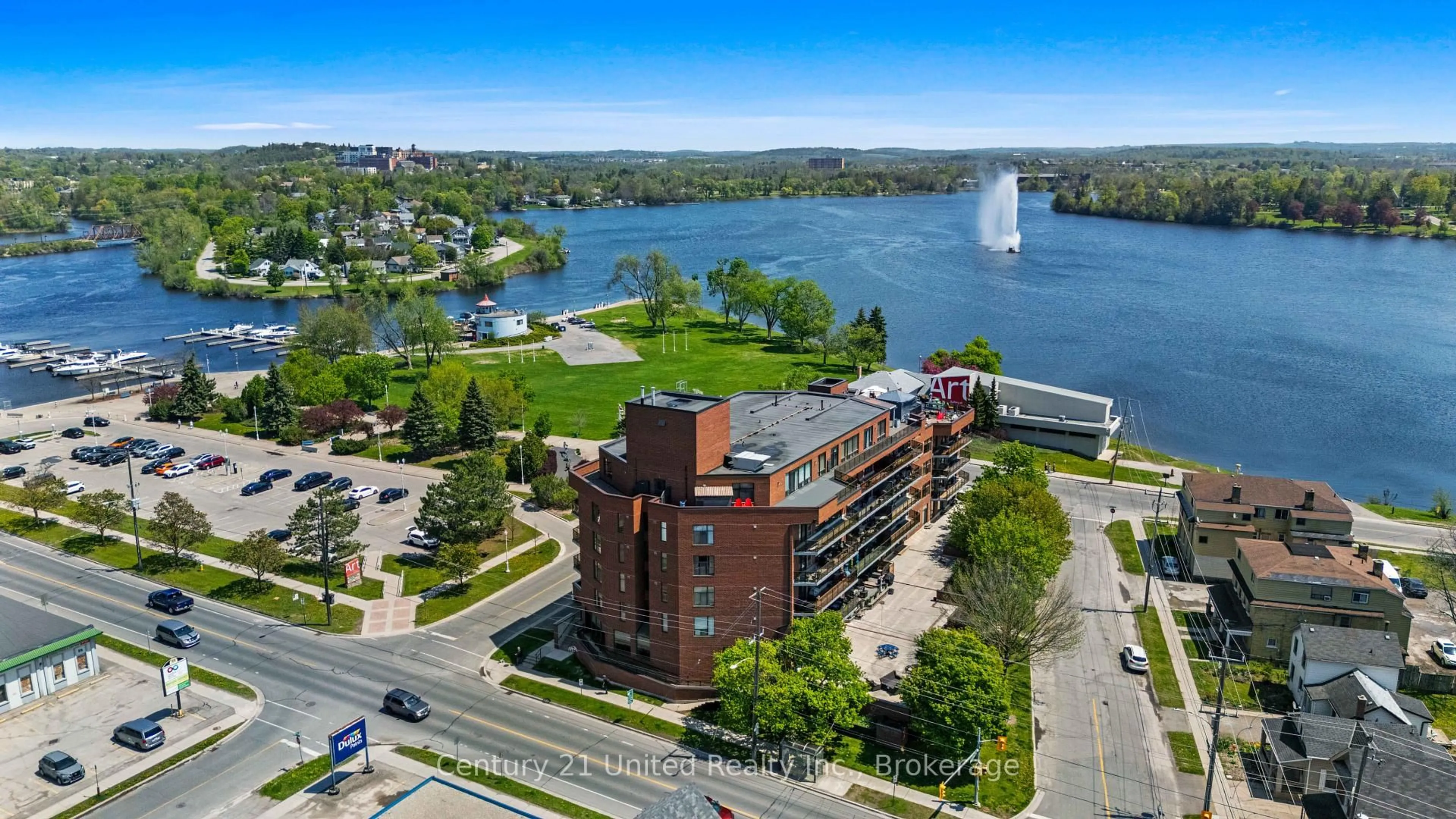 A pic from outside/outdoor area/front of a property/back of a property/a pic from drone, water/lake/river/ocean view for 2 George St #104, Peterborough Ontario K9J 8K8