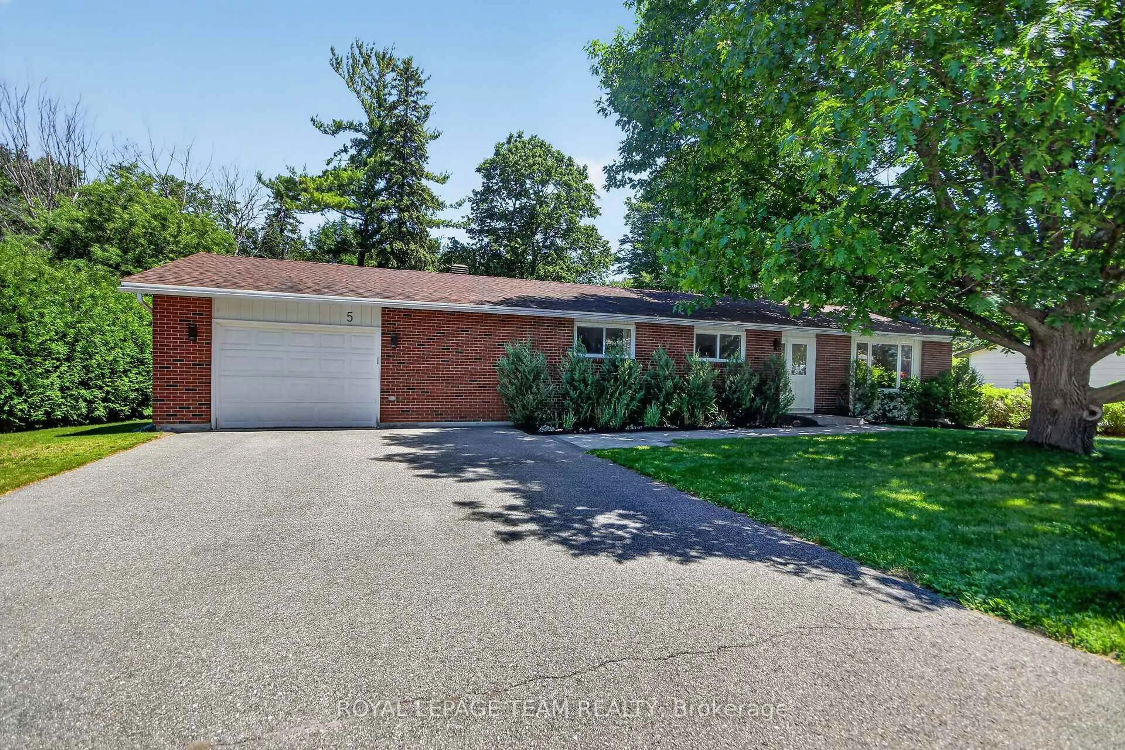 Home with brick exterior material, street for 5 Caribou Ave, Stittsville Ontario K2S 1M5