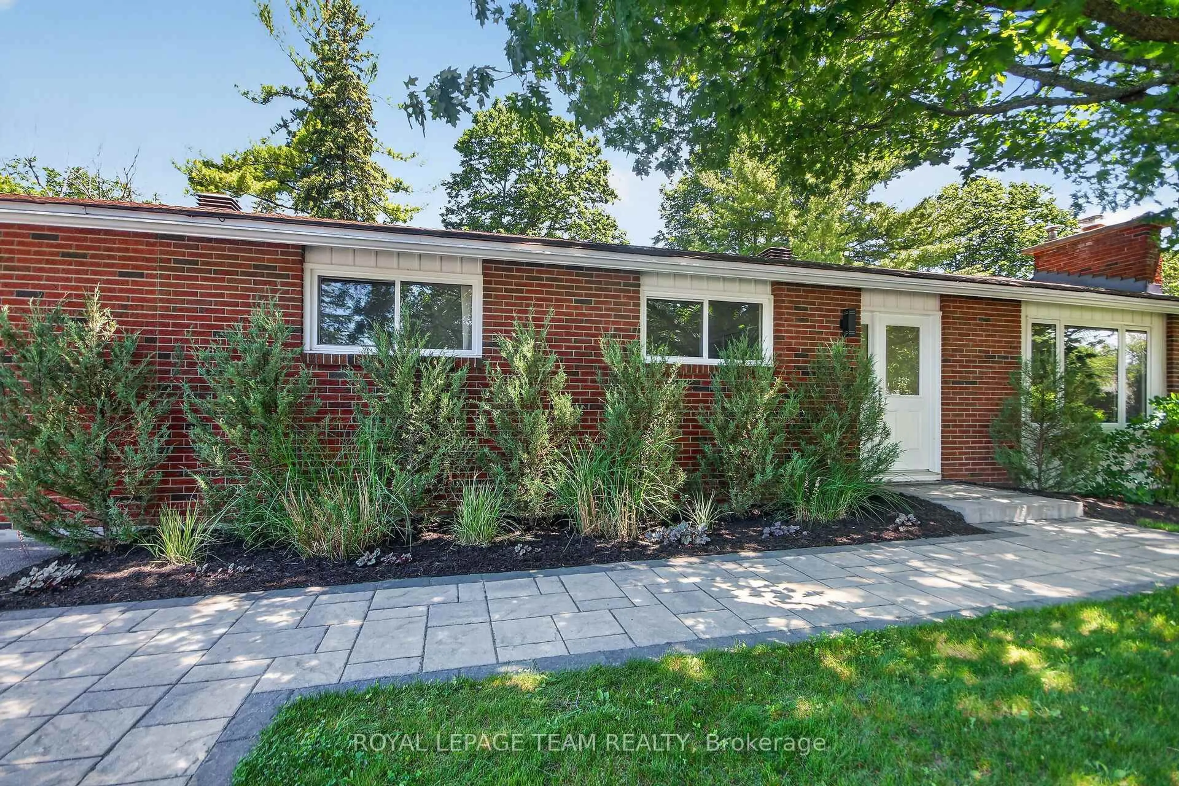 Home with brick exterior material, street for 5 Caribou Ave, Stittsville Ontario K2S 1M5