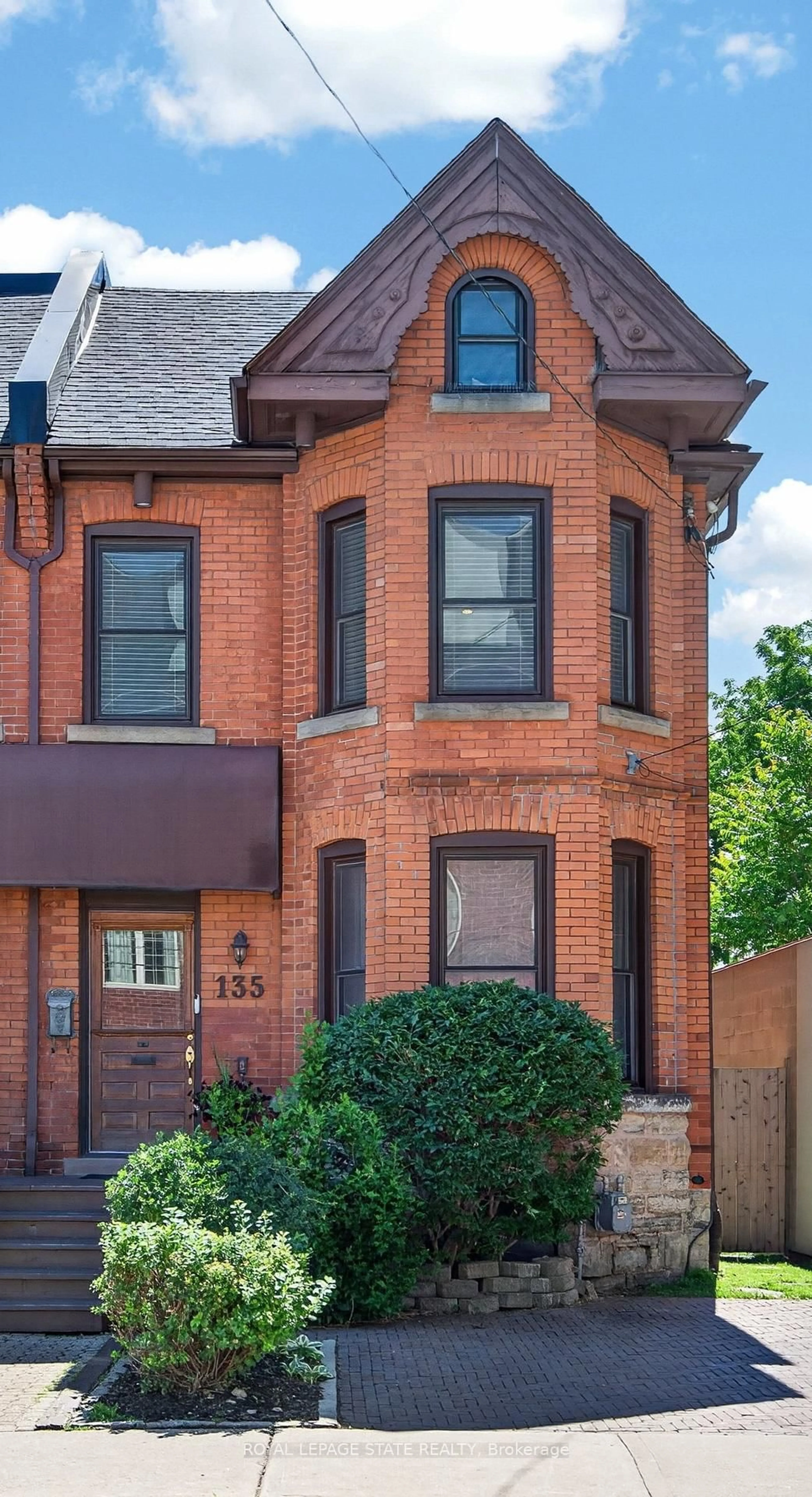 Home with brick exterior material, street for 135 Catharine St, Hamilton Ontario L8N 2J6
