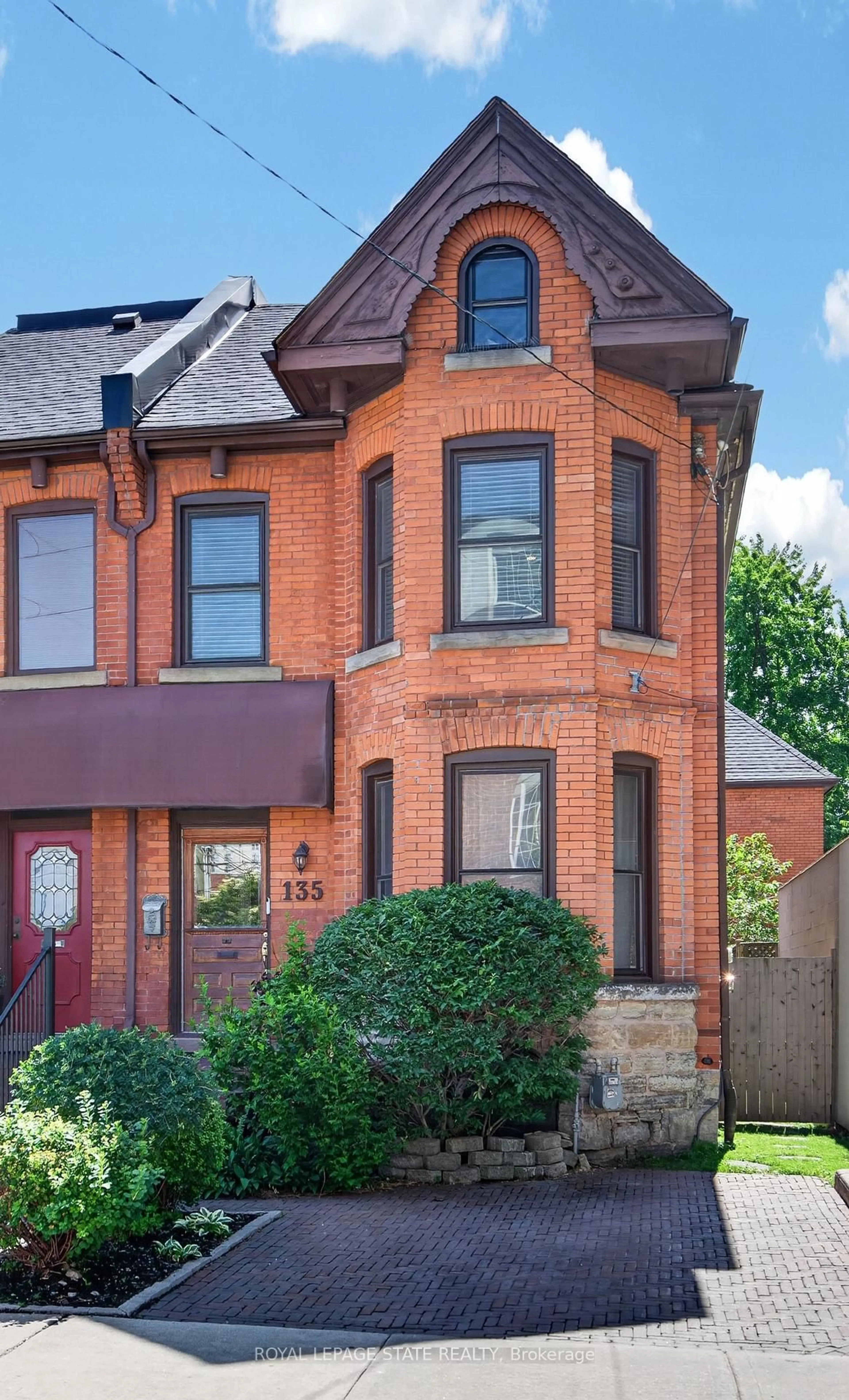Home with brick exterior material, street for 135 Catharine St, Hamilton Ontario L8N 2J6