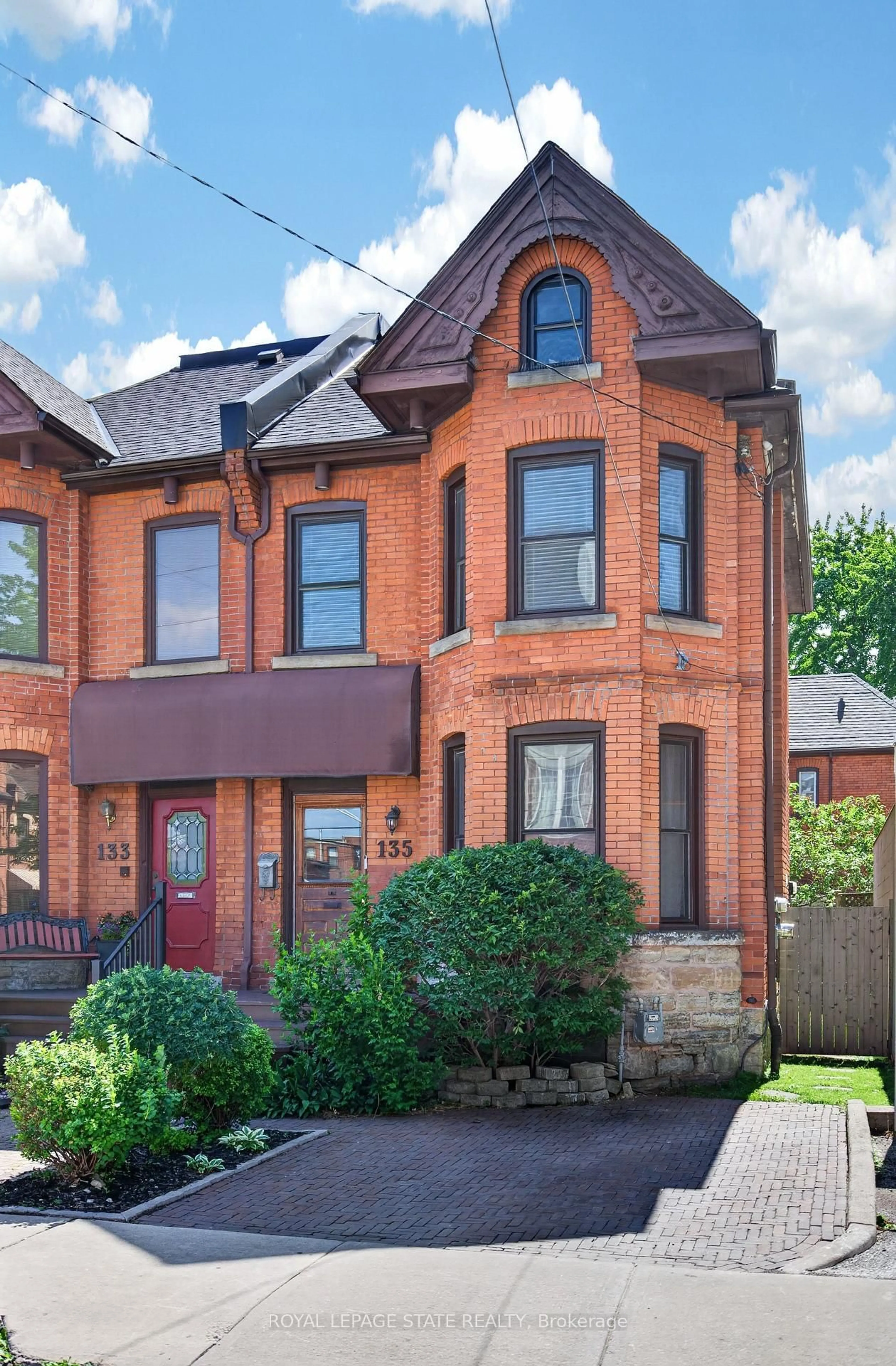 Home with brick exterior material, street for 135 Catharine St, Hamilton Ontario L8N 2J6