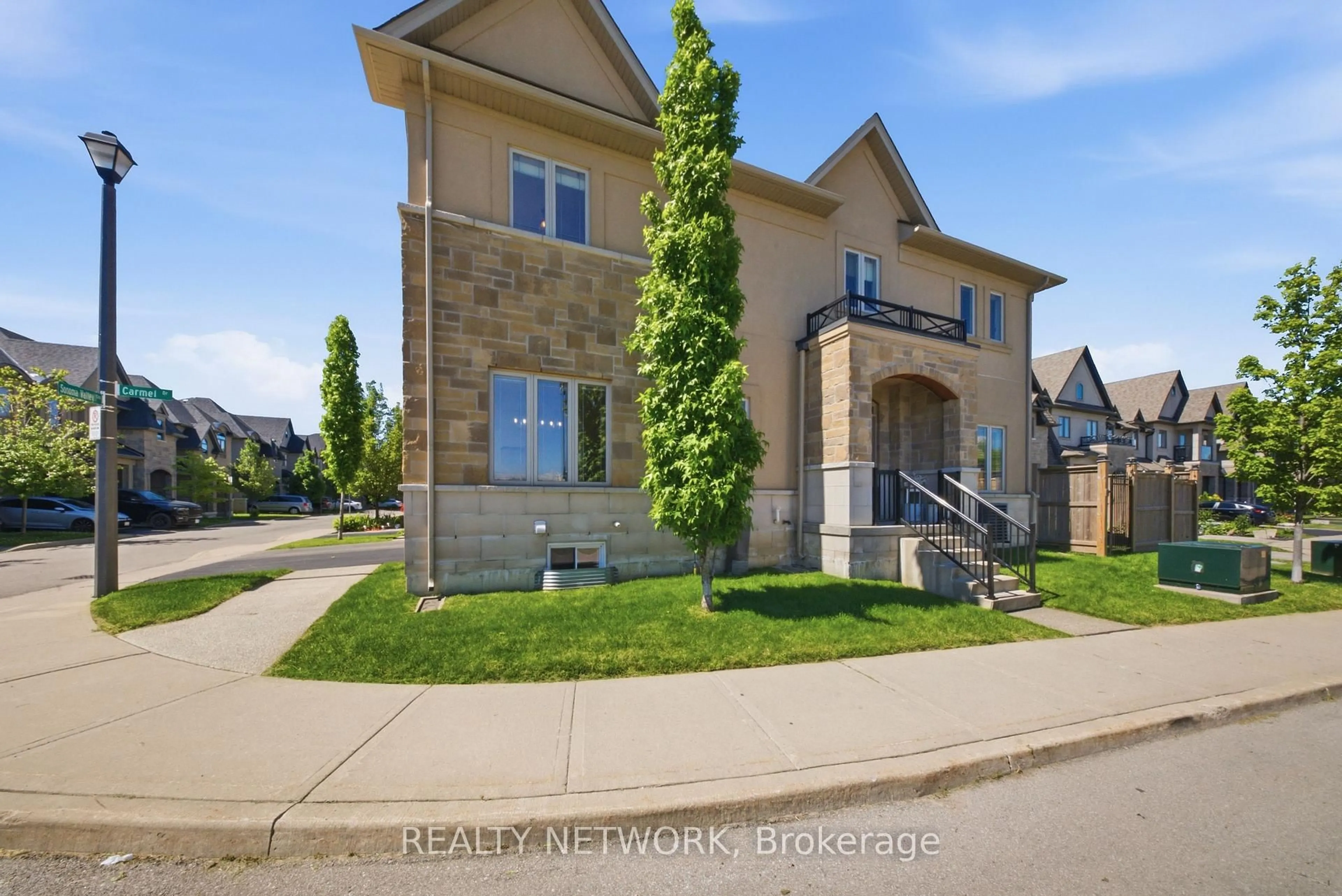 Home with brick exterior material, street for 104 Sonoma Valley Cres, Hamilton Ontario L9B 0J3