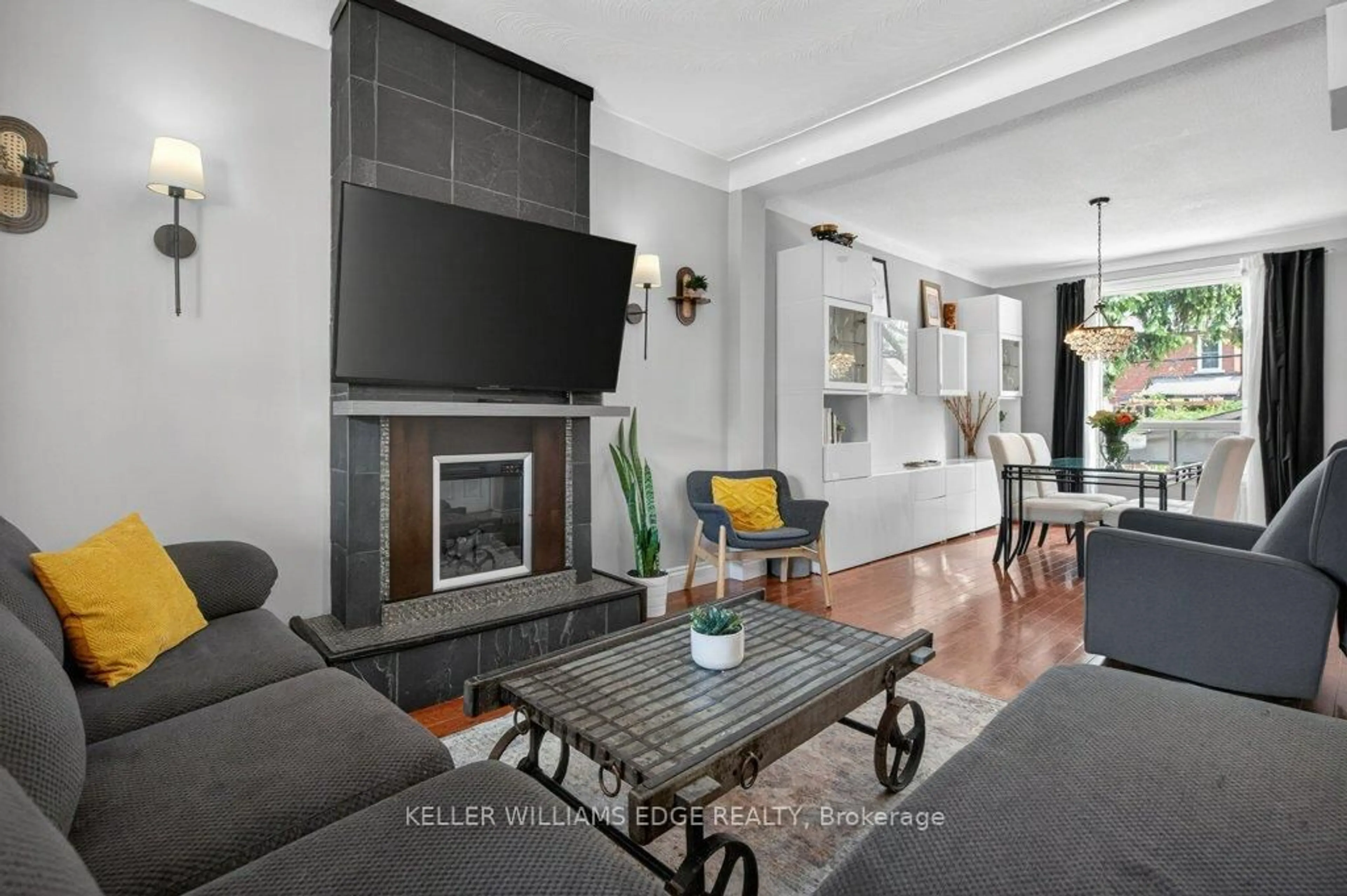 Living room with furniture, ceramic/tile floor for 225 Prospect St, Hamilton Ontario L8M 2Z6