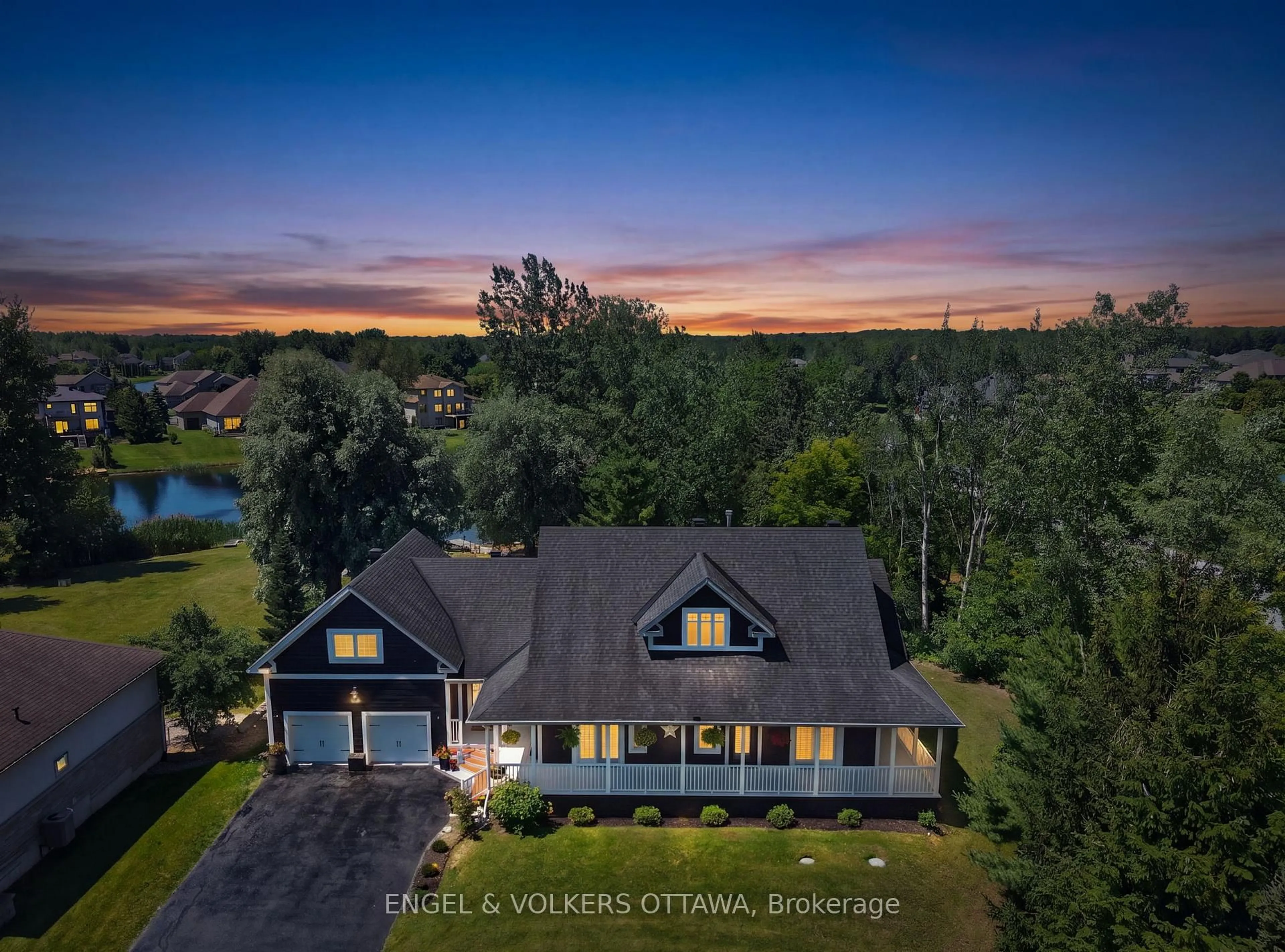 A pic from outside/outdoor area/front of a property/back of a property/a pic from drone, water/lake/river/ocean view for 6881 Sparkling Lake Way, Greely Ontario K4P 1R7