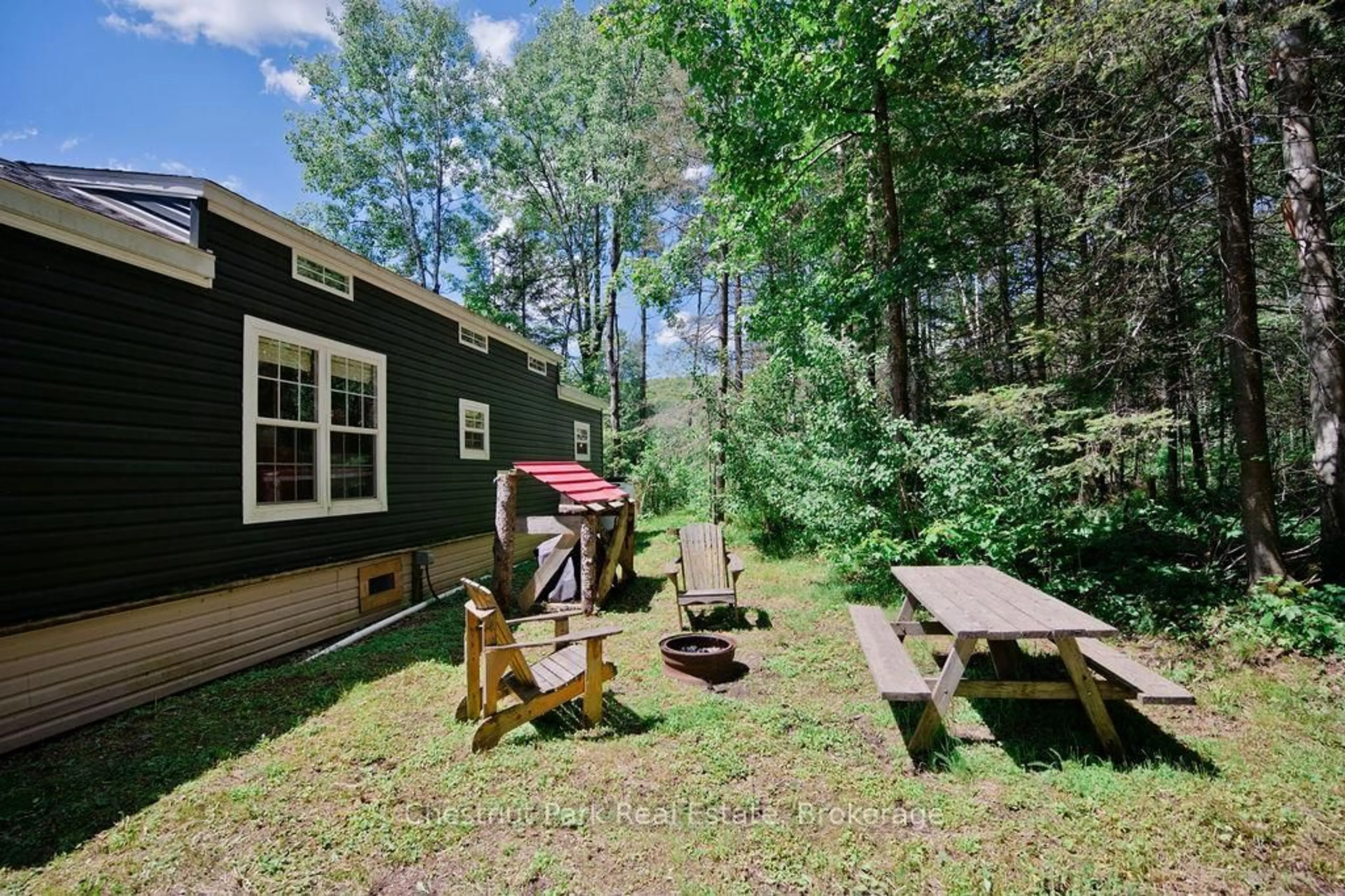 Patio, forest/trees view for 98 North Shore Rd #Unit 1, Kearney Ontario P0A 1M0