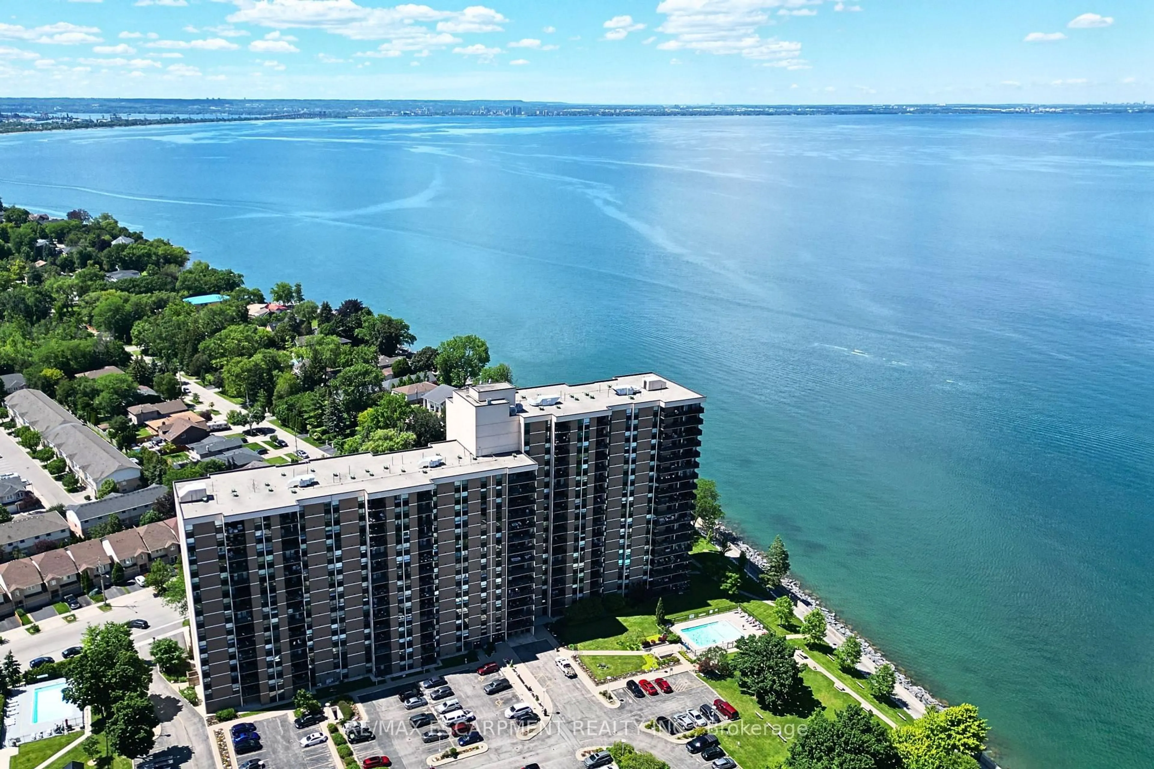 A pic from outside/outdoor area/front of a property/back of a property/a pic from drone, water/lake/river/ocean view for 500 Green Rd #211, Hamilton Ontario L8E 3M6