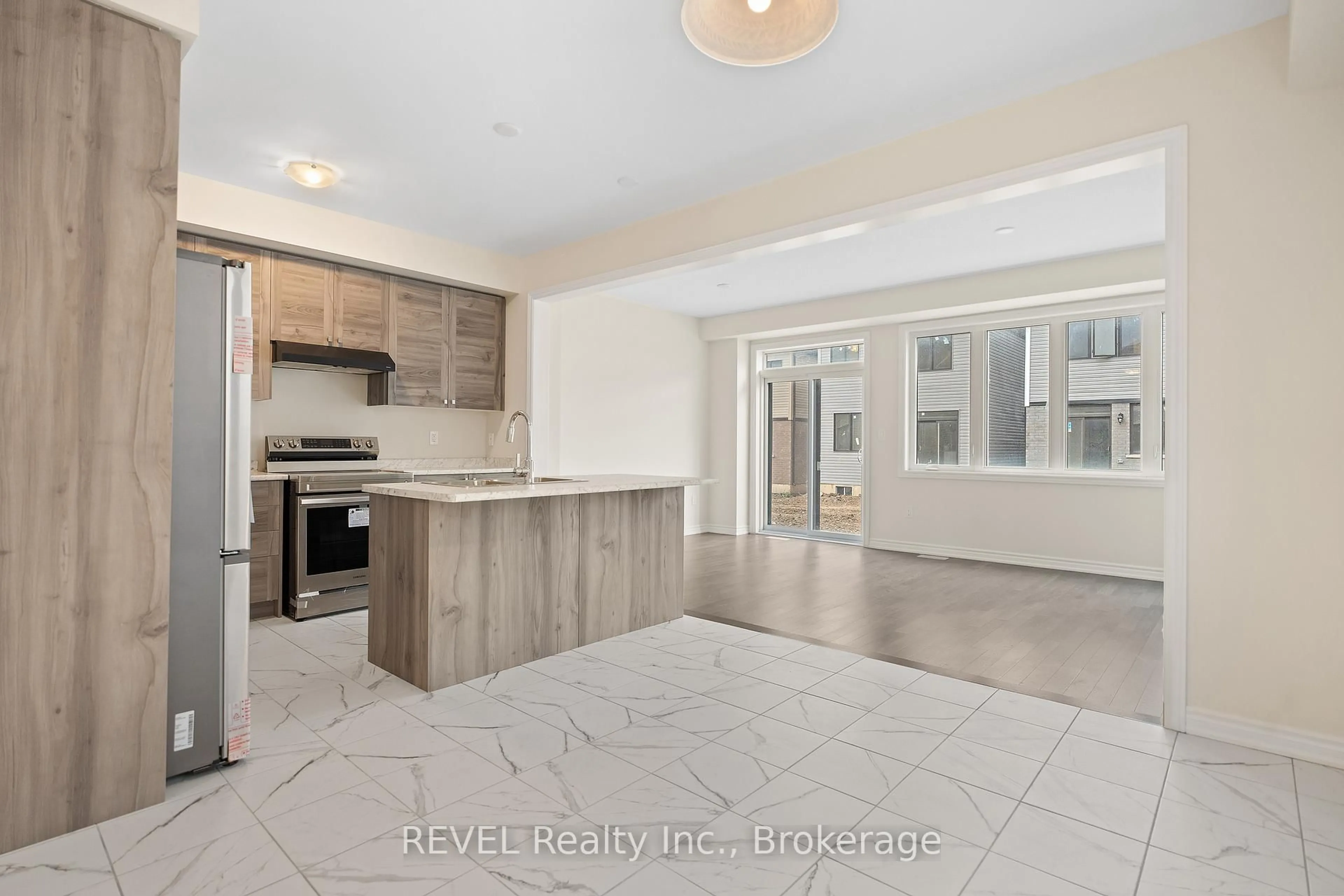 Open concept kitchen, ceramic/tile floor for 59 Ever Sweet Way, Thorold Ontario L2V 0K9