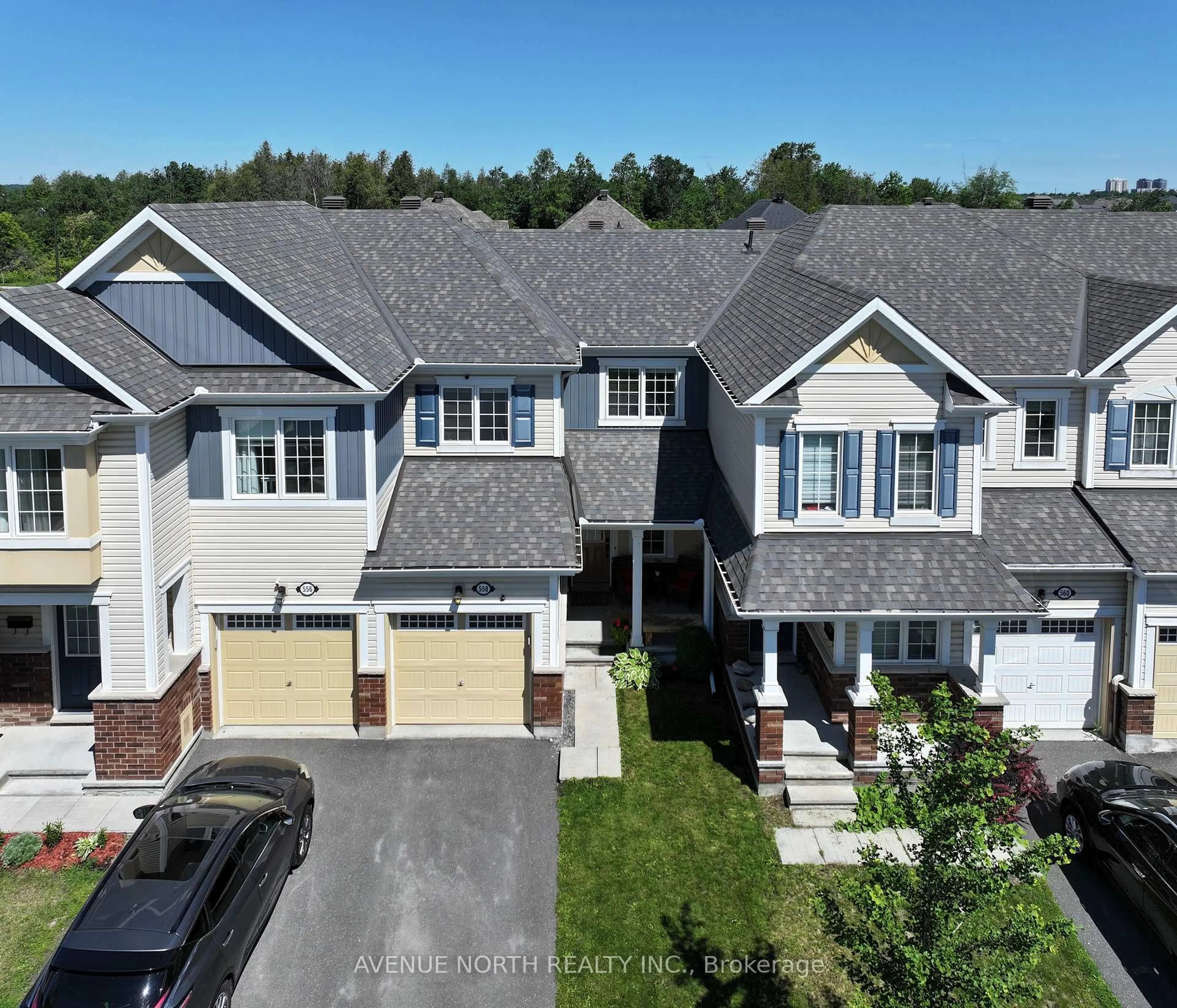 A pic from outside/outdoor area/front of a property/back of a property/a pic from drone, street for 558 Ensatina Cres, Ottawa Ontario K2J 6H4