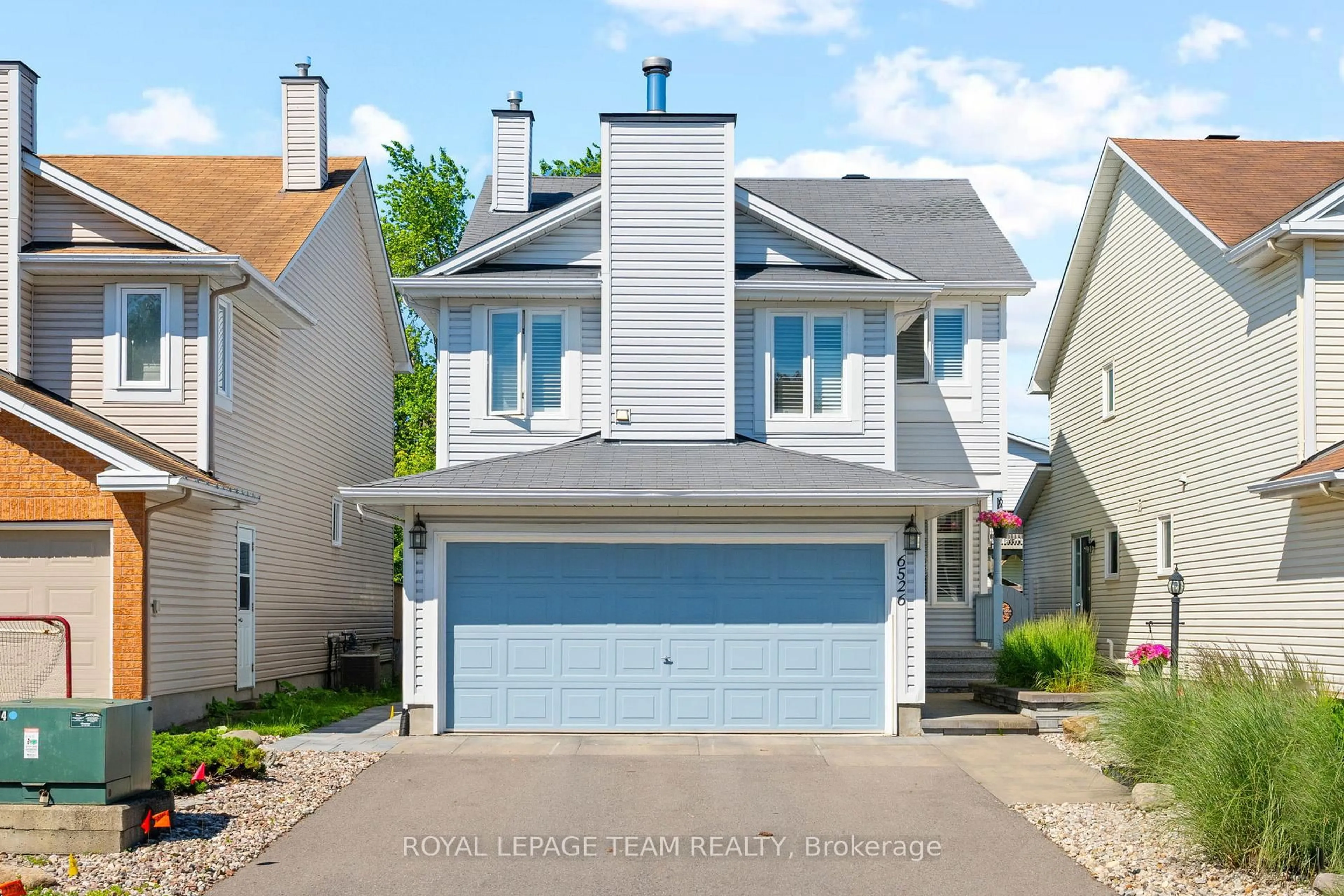 Home with vinyl exterior material, street for 6526 Tooney Dr, Ottawa Ontario K1C 7G9