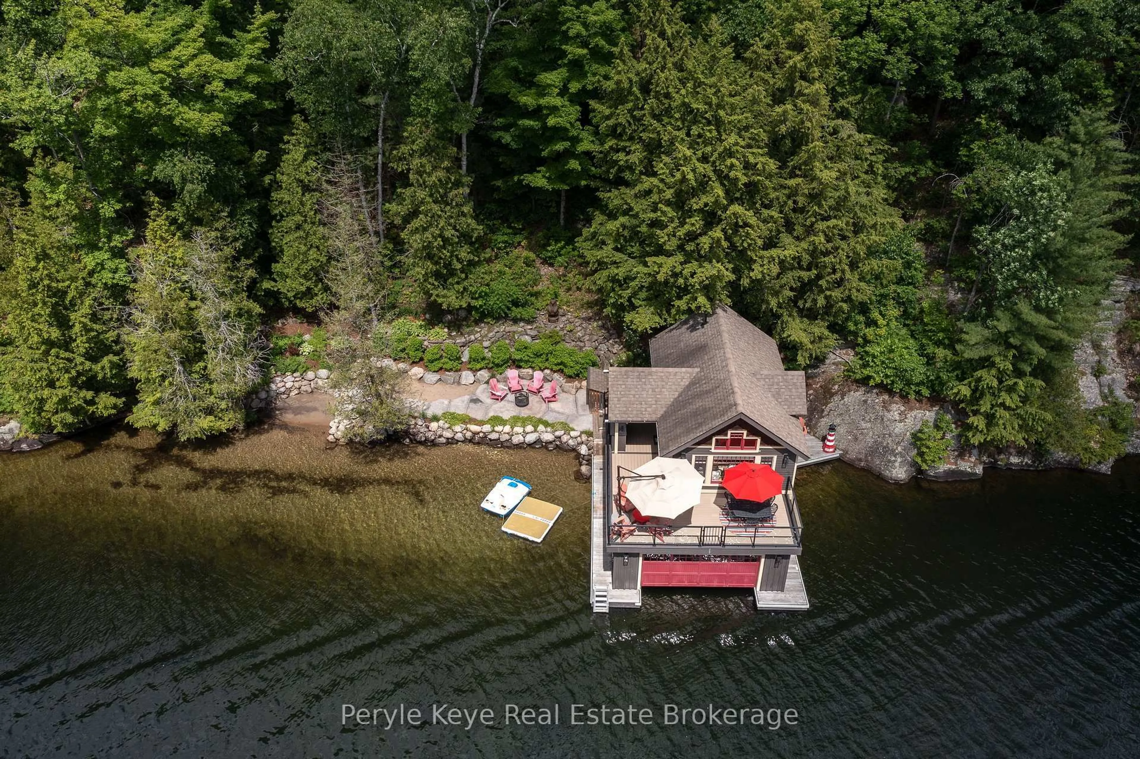 A pic from outside/outdoor area/front of a property/back of a property/a pic from drone, water/lake/river/ocean view for 41 Beaumont Bay Rd, Muskoka Lakes Ontario P0B 1M0