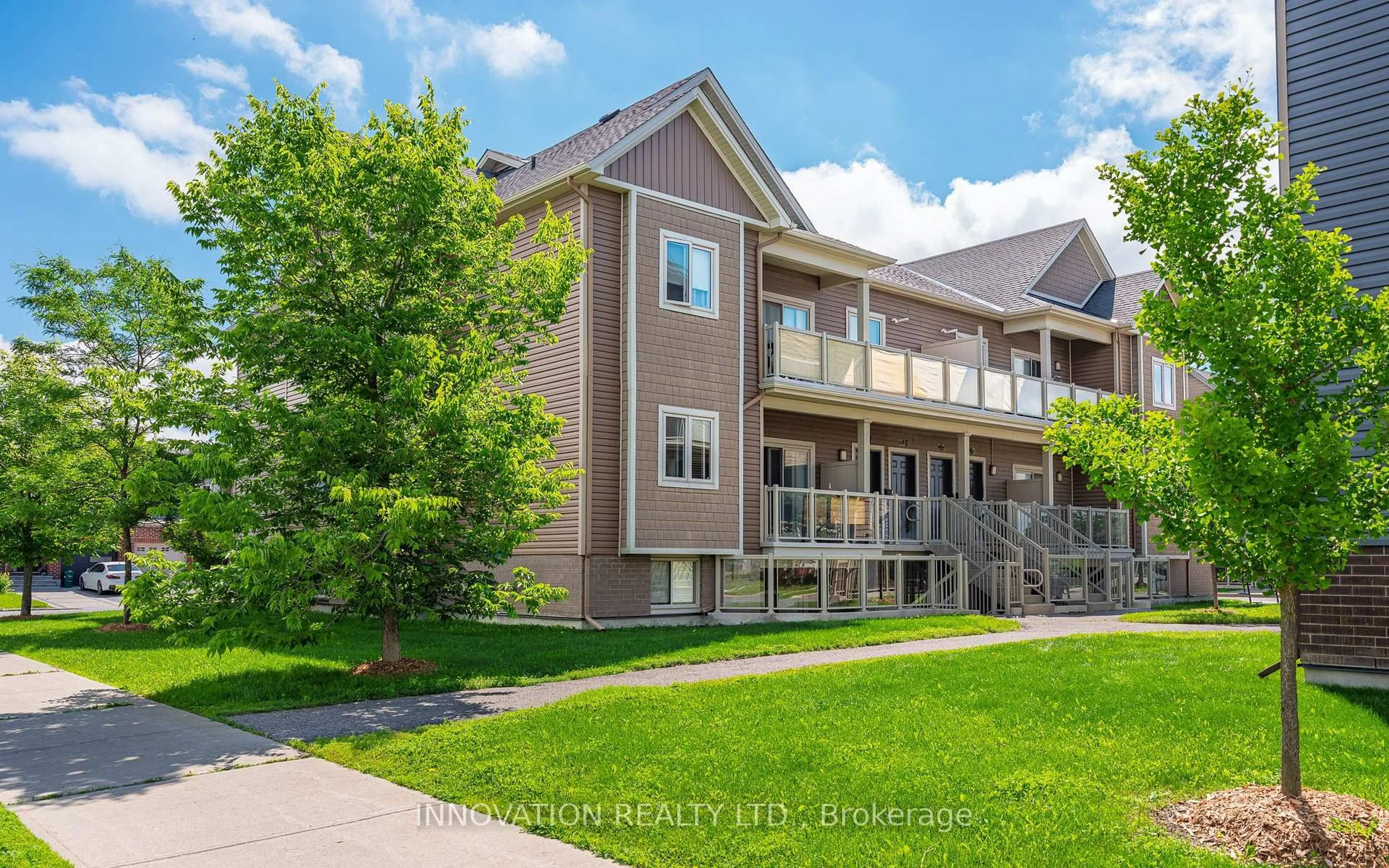 A pic from outside/outdoor area/front of a property/back of a property/a pic from drone, unknown for 319 BIG SKY Private, Ottawa Ontario K1T 0M8