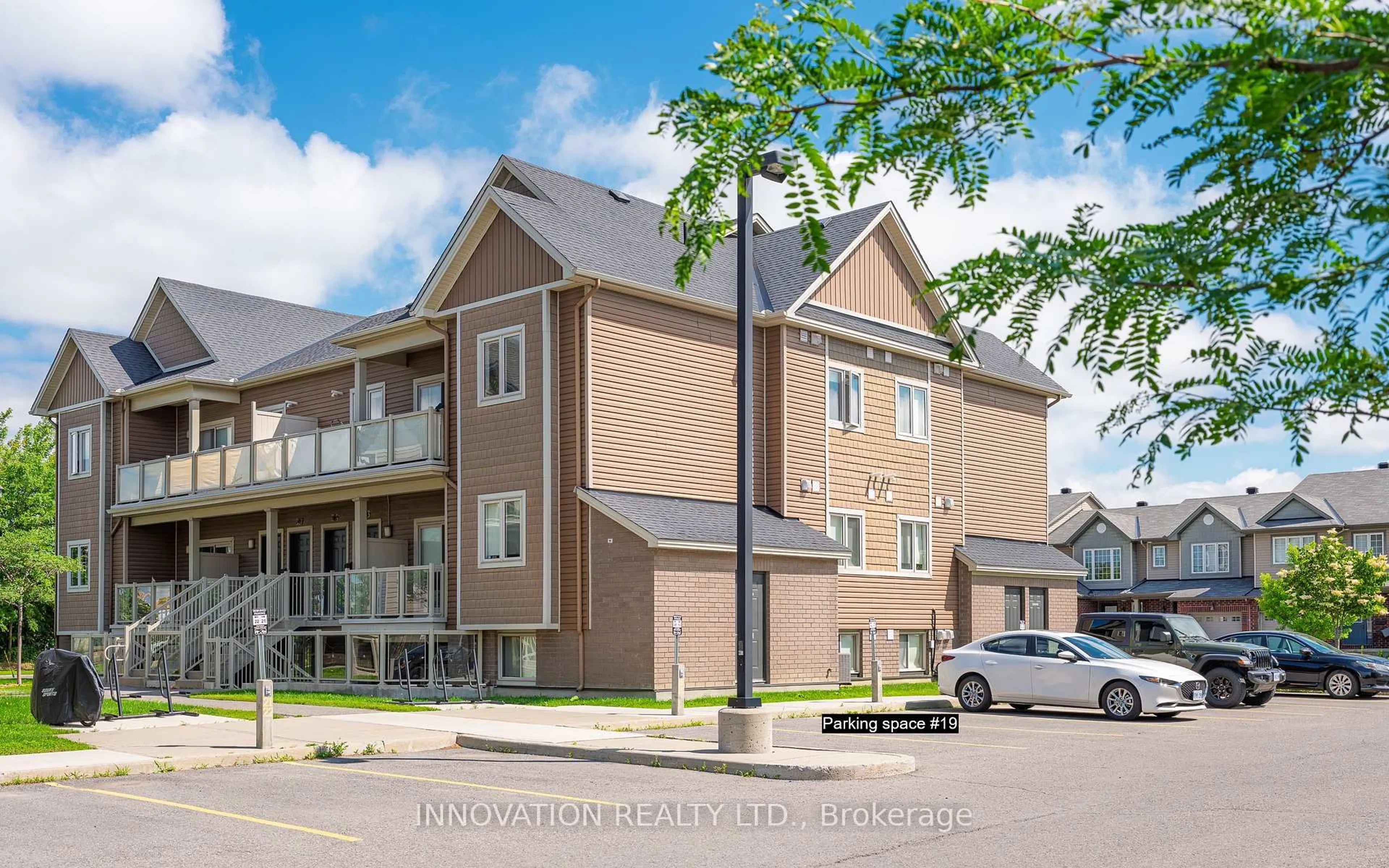 Home with vinyl exterior material, street for 319 BIG SKY Private, Ottawa Ontario K1T 0M8