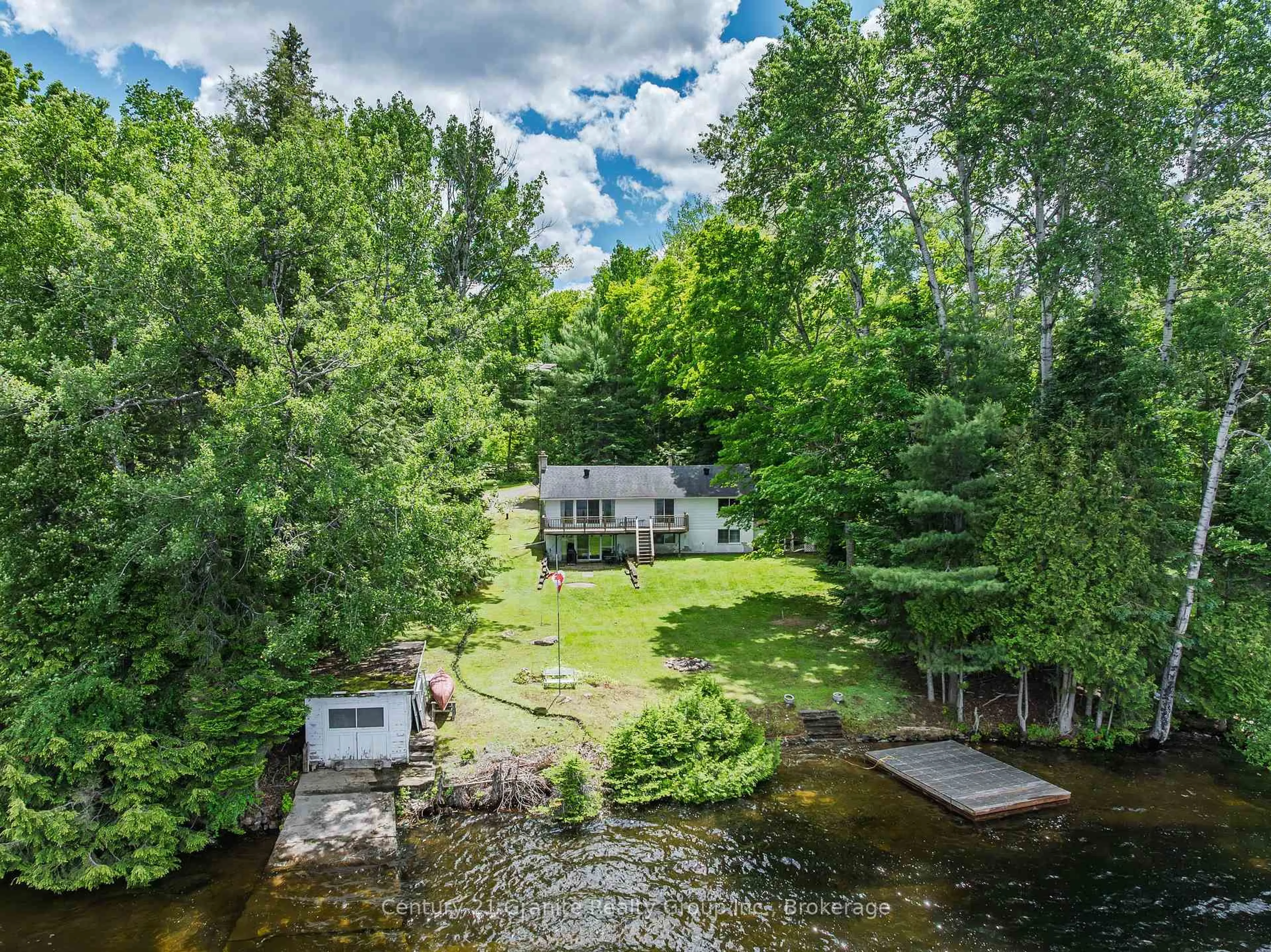 A pic from outside/outdoor area/front of a property/back of a property/a pic from drone, water/lake/river/ocean view for 1950 Curry Rd, Dysart et al Ontario K0M 1S0