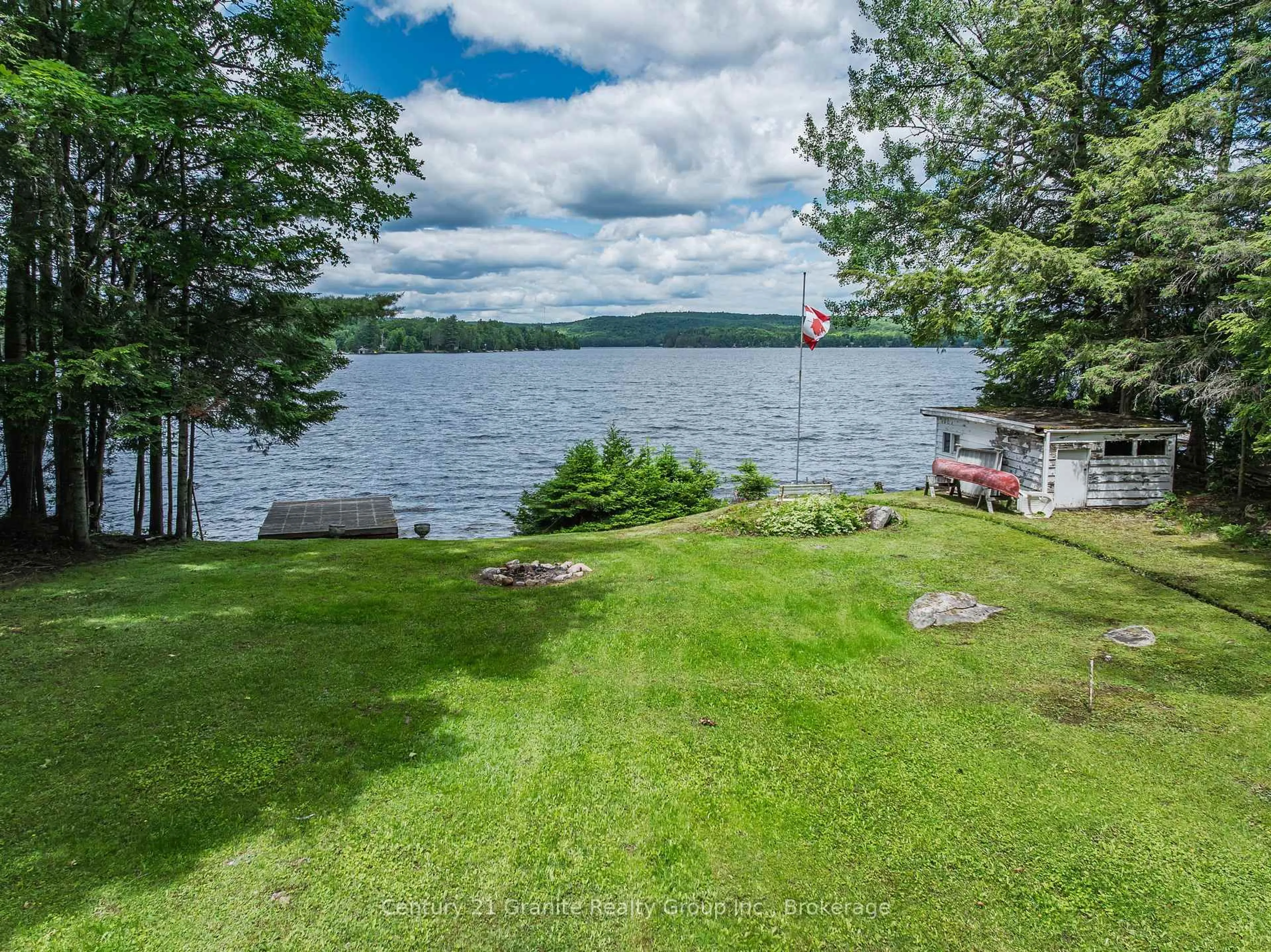 A pic from outside/outdoor area/front of a property/back of a property/a pic from drone, water/lake/river/ocean view for 1950 Curry Rd, Dysart et al Ontario K0M 1S0