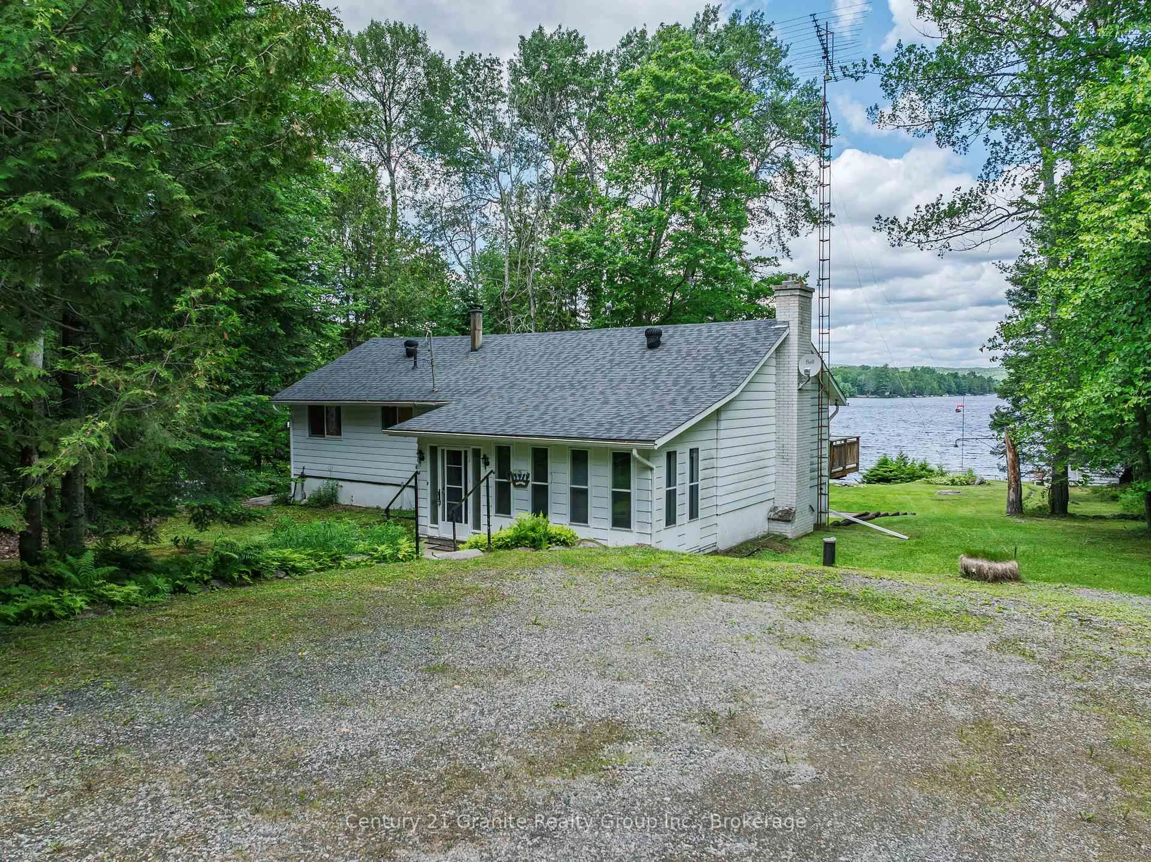 A pic from outside/outdoor area/front of a property/back of a property/a pic from drone, water/lake/river/ocean view for 1950 Curry Rd, Dysart et al Ontario K0M 1S0