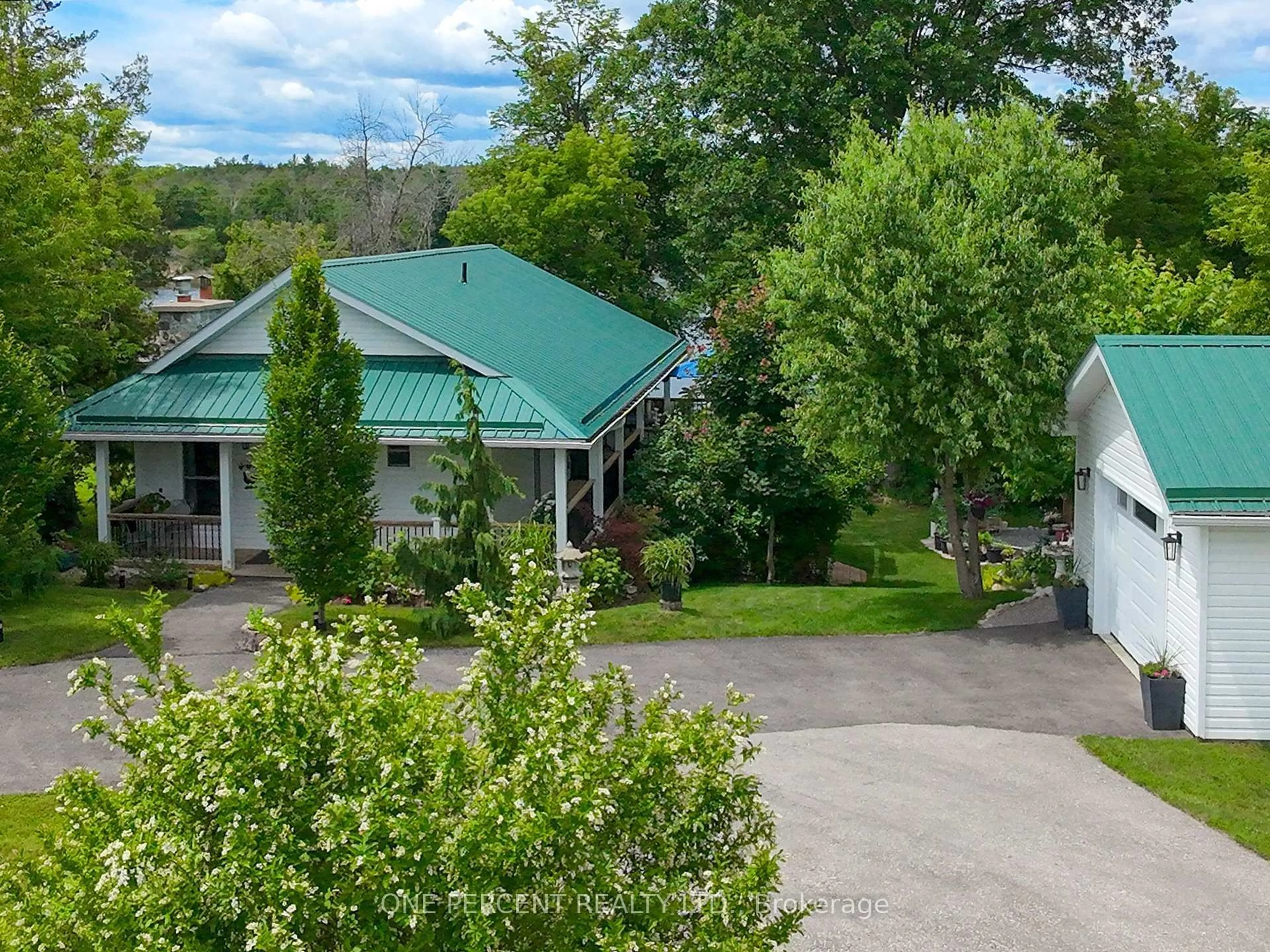 A pic from outside/outdoor area/front of a property/back of a property/a pic from drone, mountain view for 424 County Rd 38 Rd, Trent Hills Ontario K0L 1L0